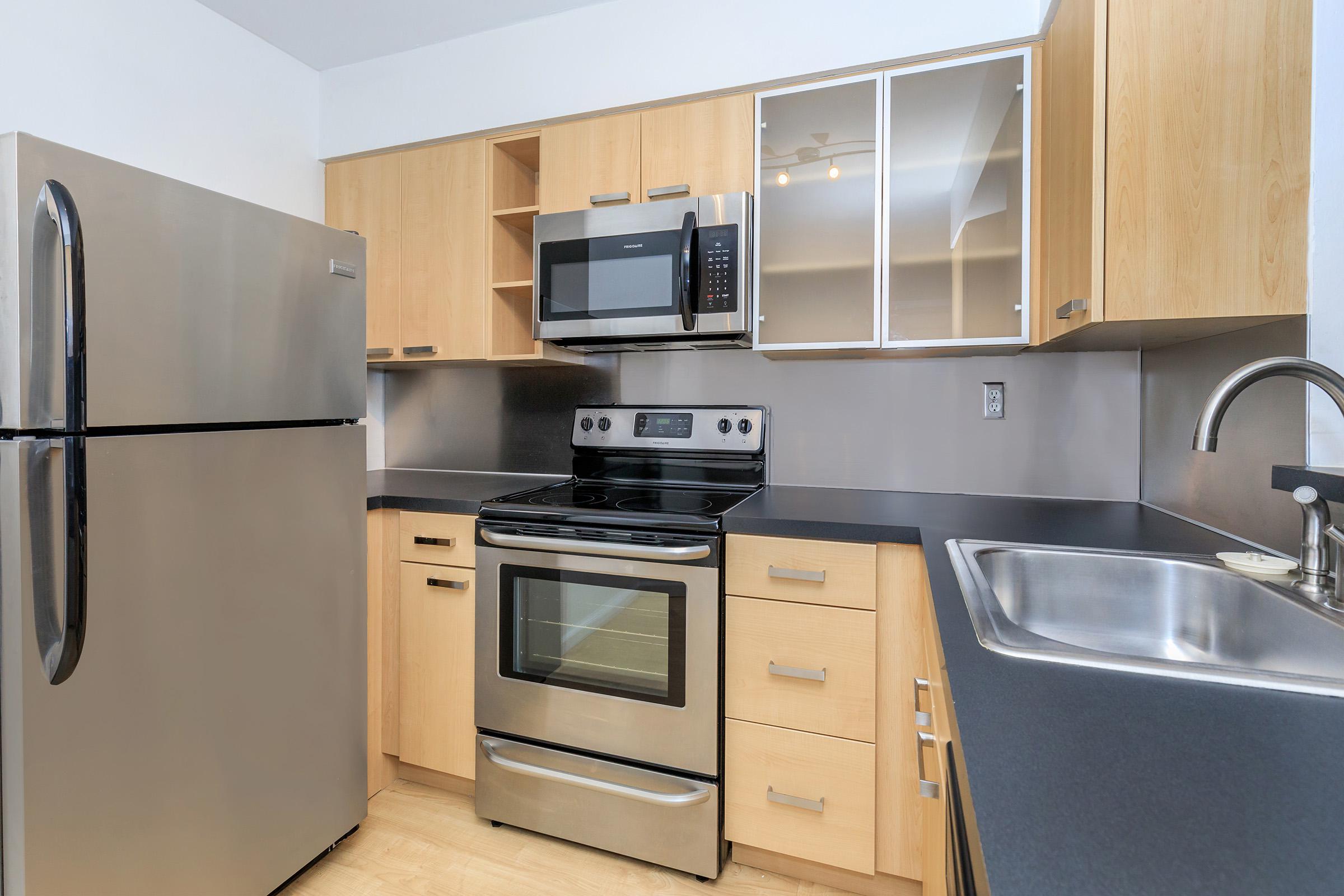 a kitchen with stainless steel appliances