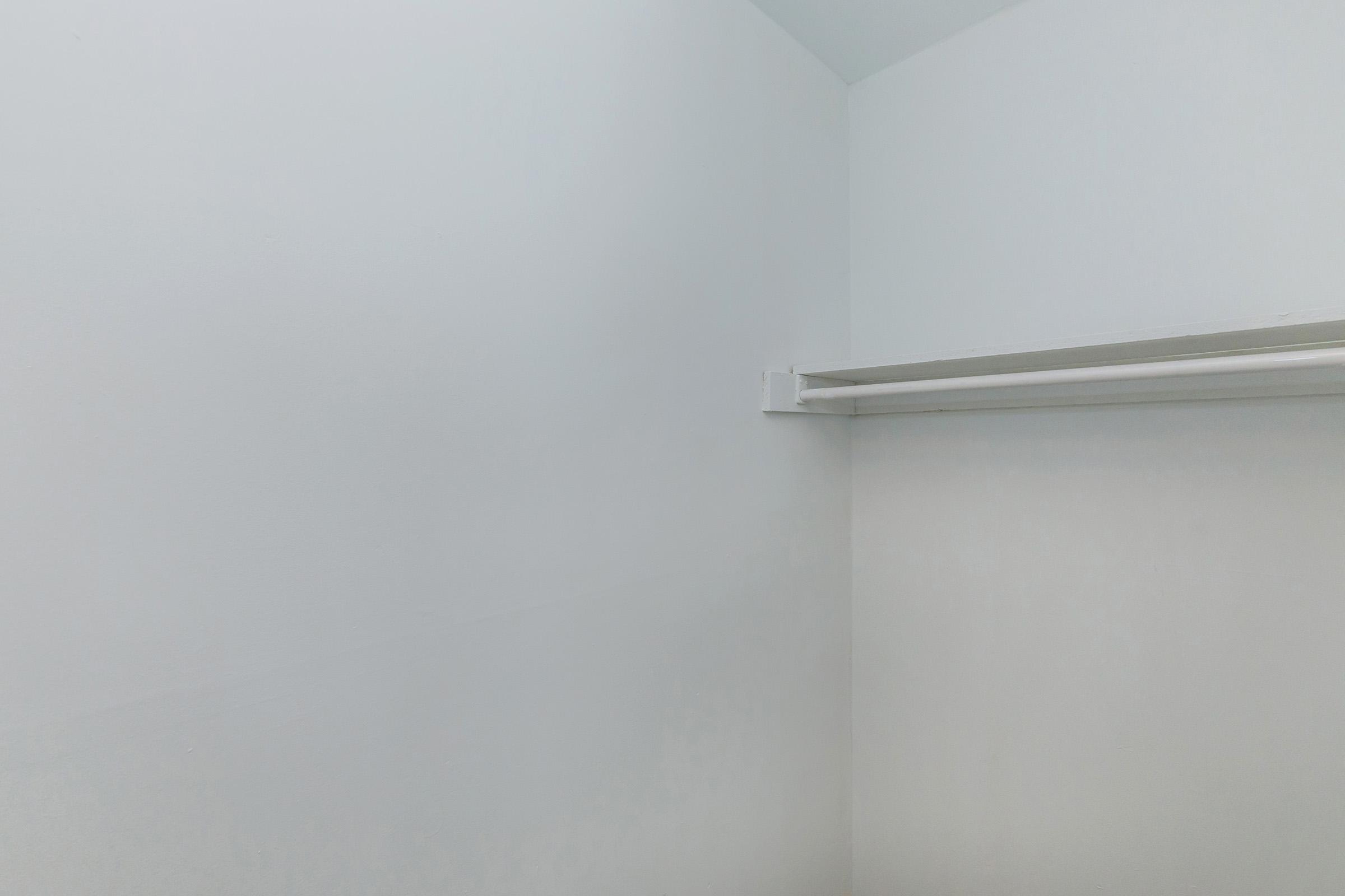 a close up of a white wall