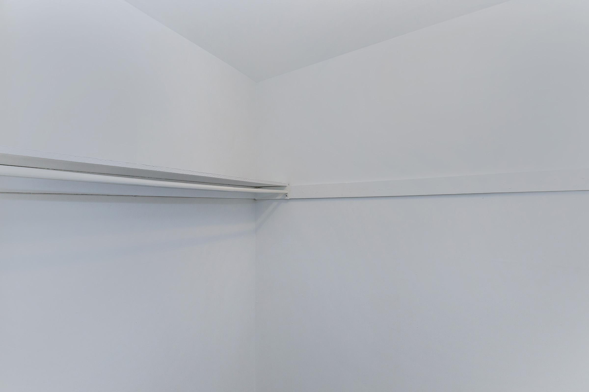 a close up of a white wall