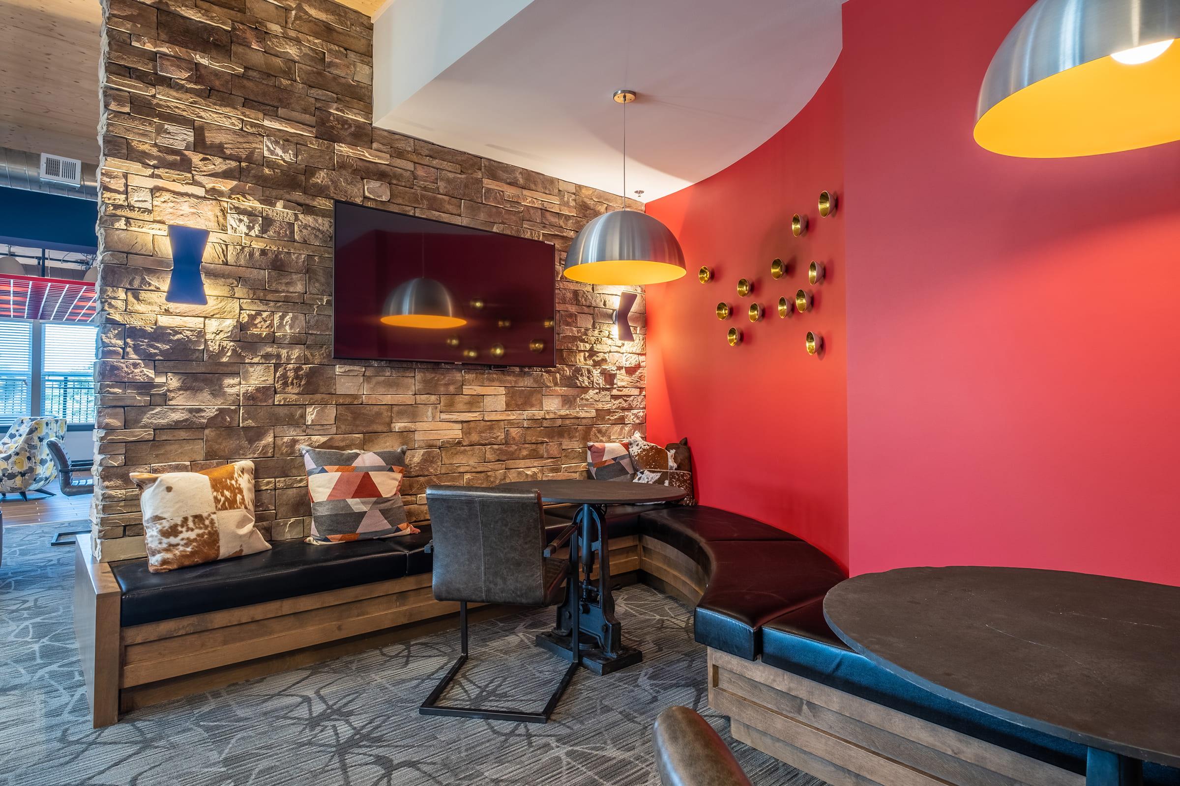 a living room filled with furniture and a fireplace