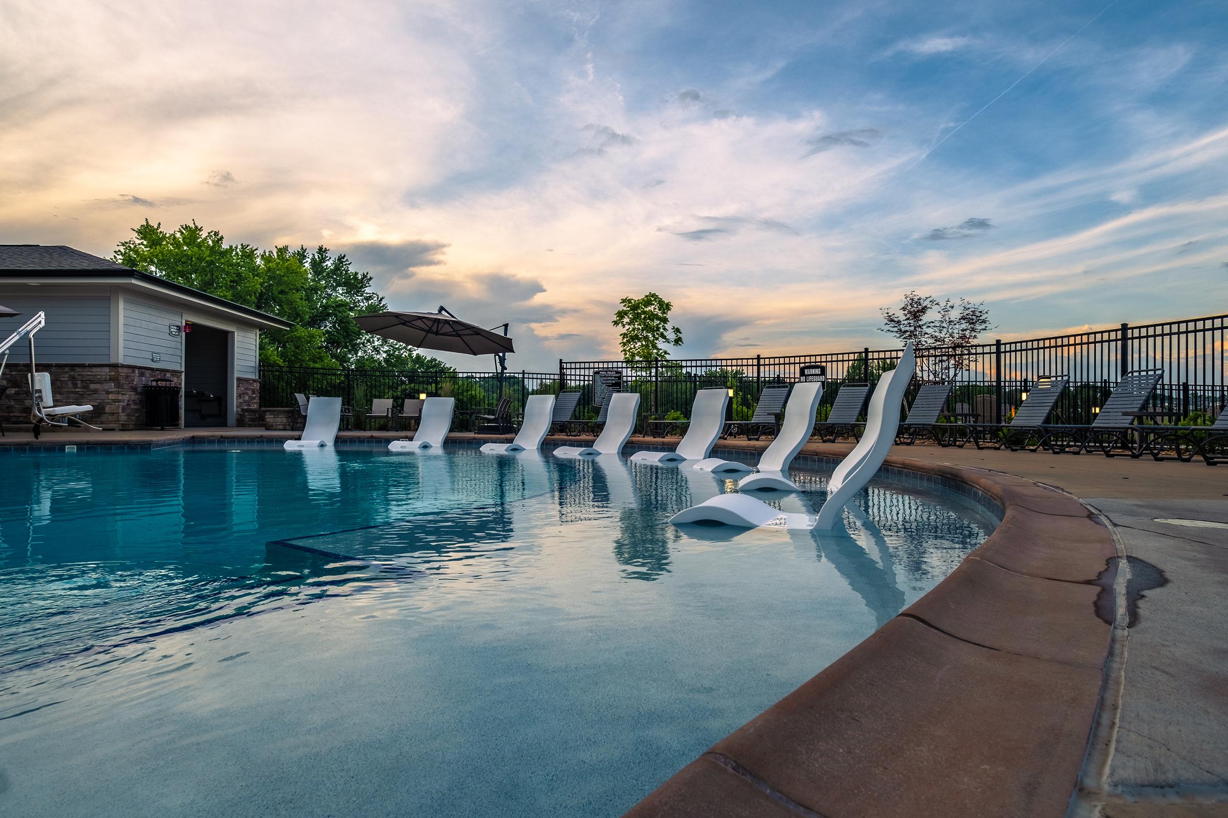 a pool next to a body of water