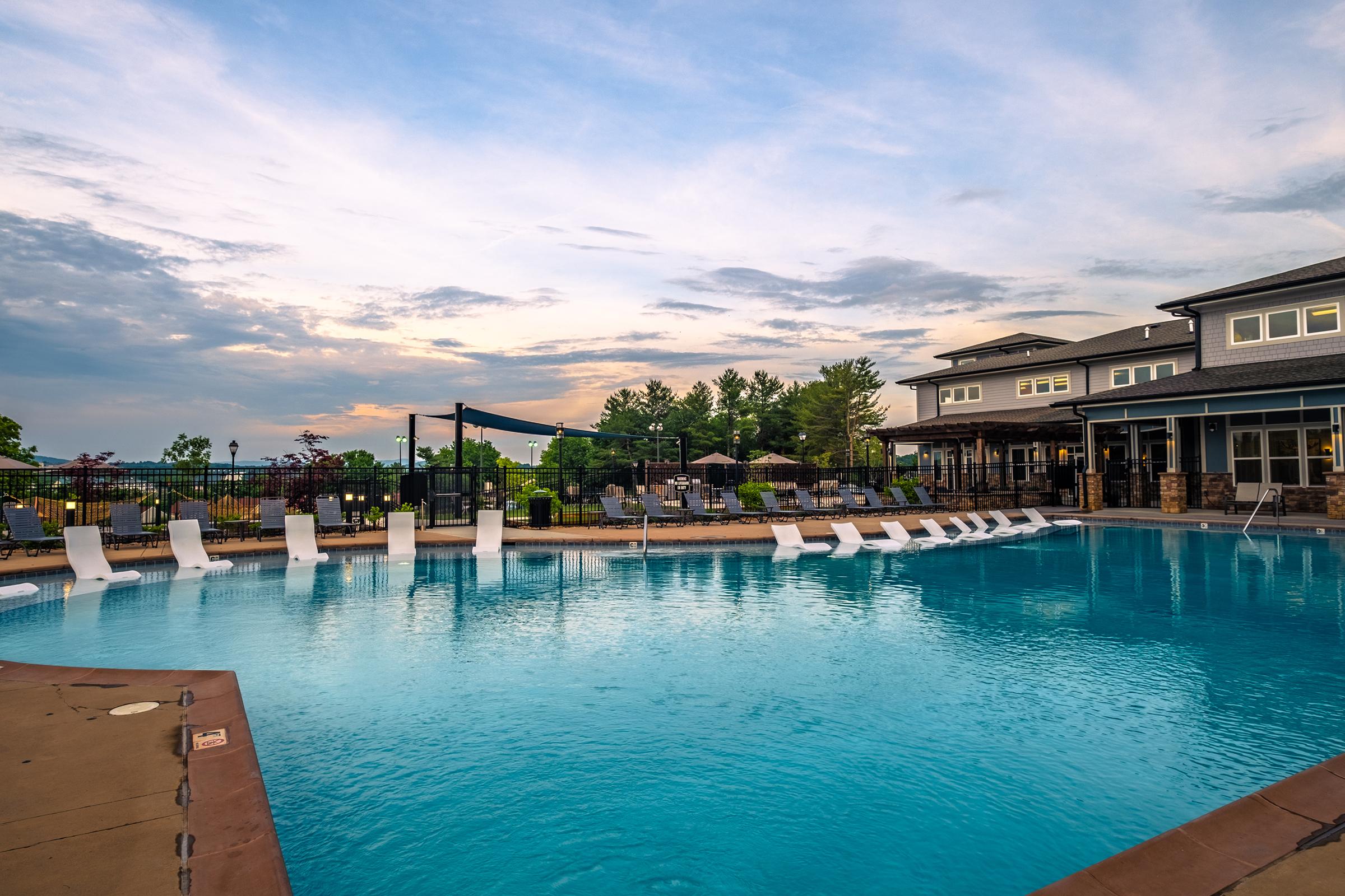 a pool next to a body of water