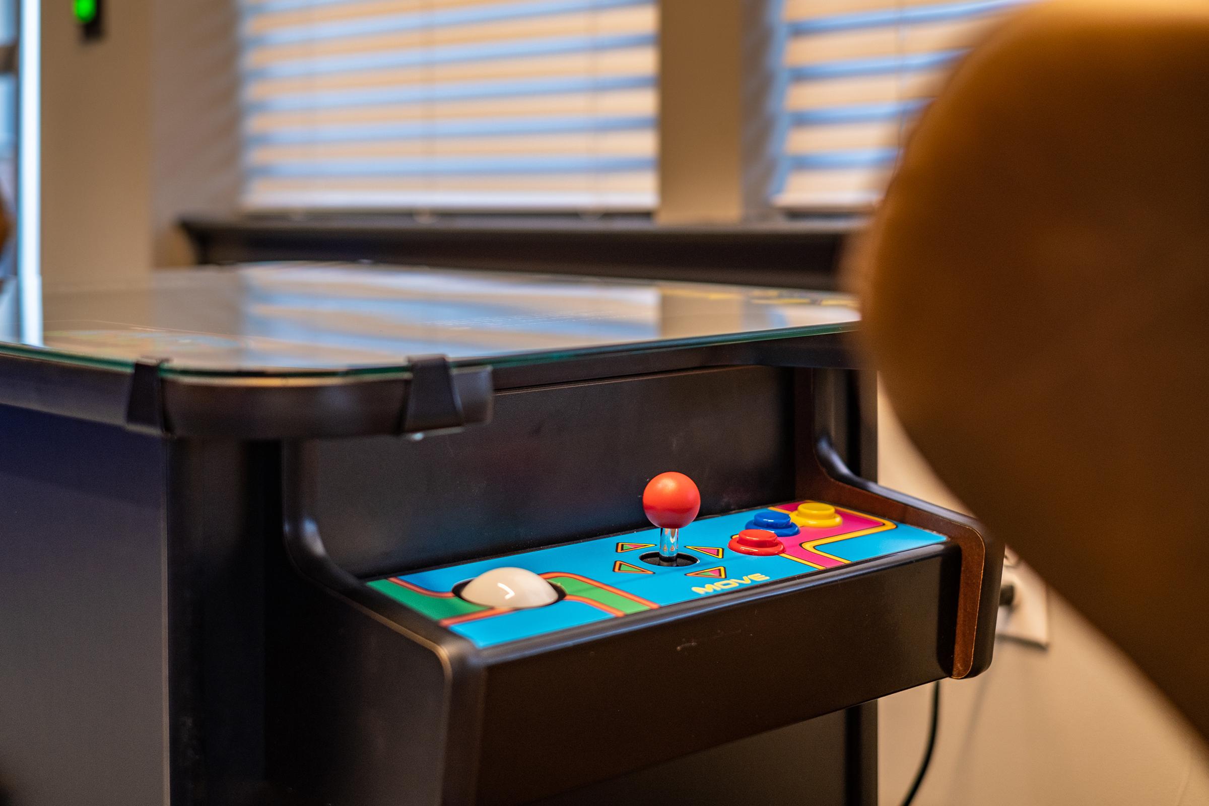 a laptop computer sitting on top of a table