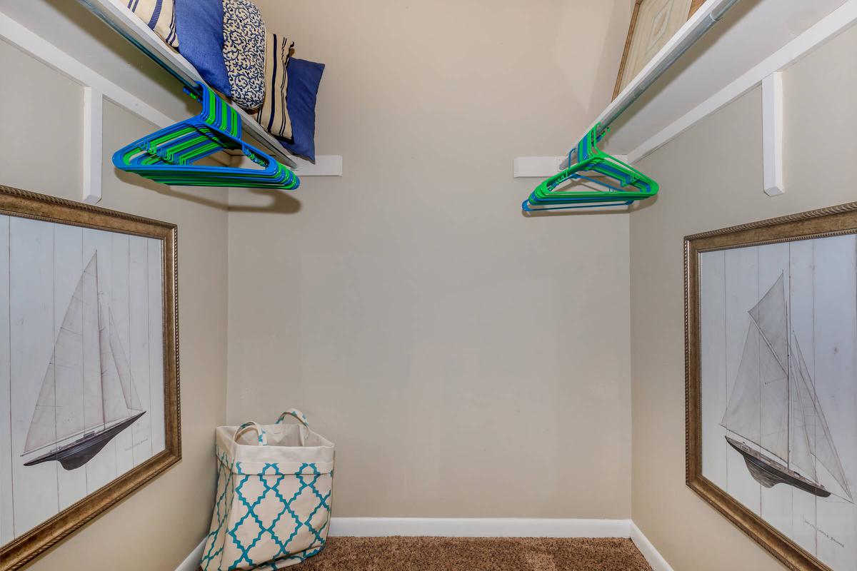 a room with a sink and a mirror