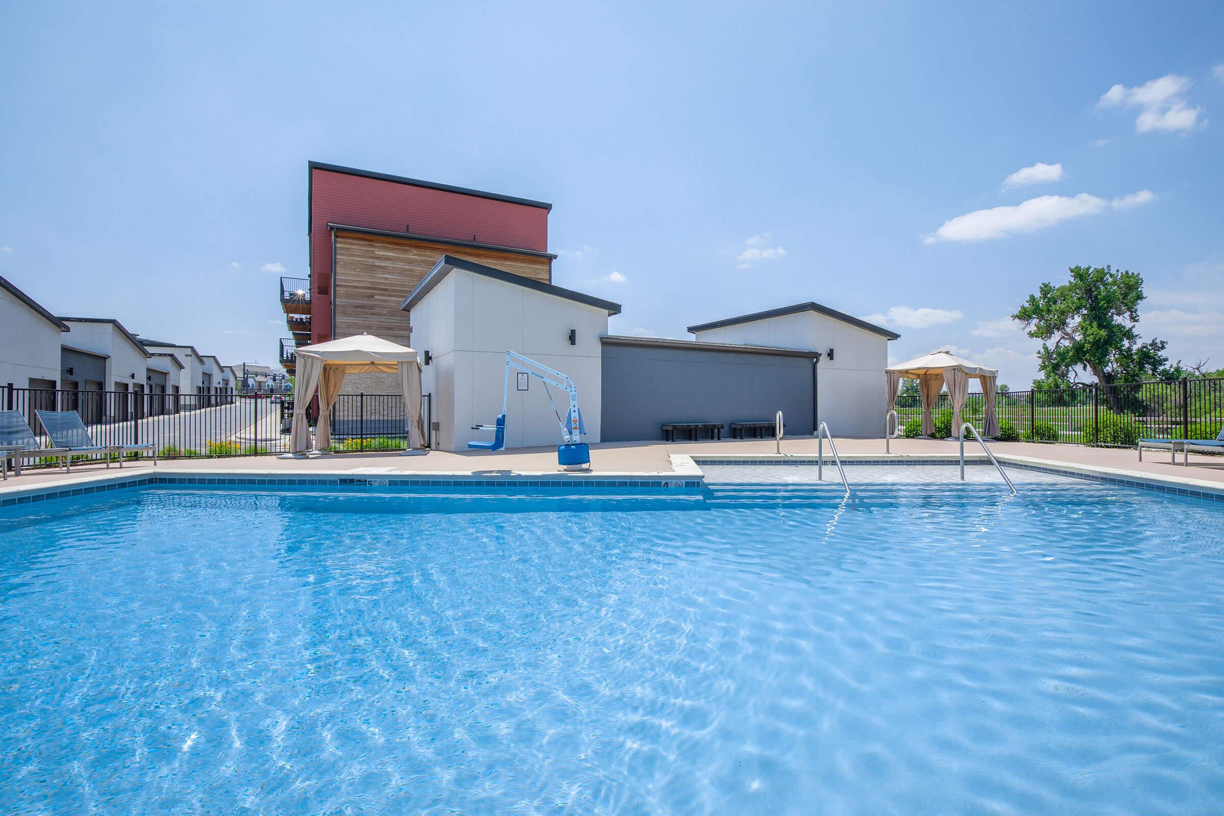 a pool next to a body of water