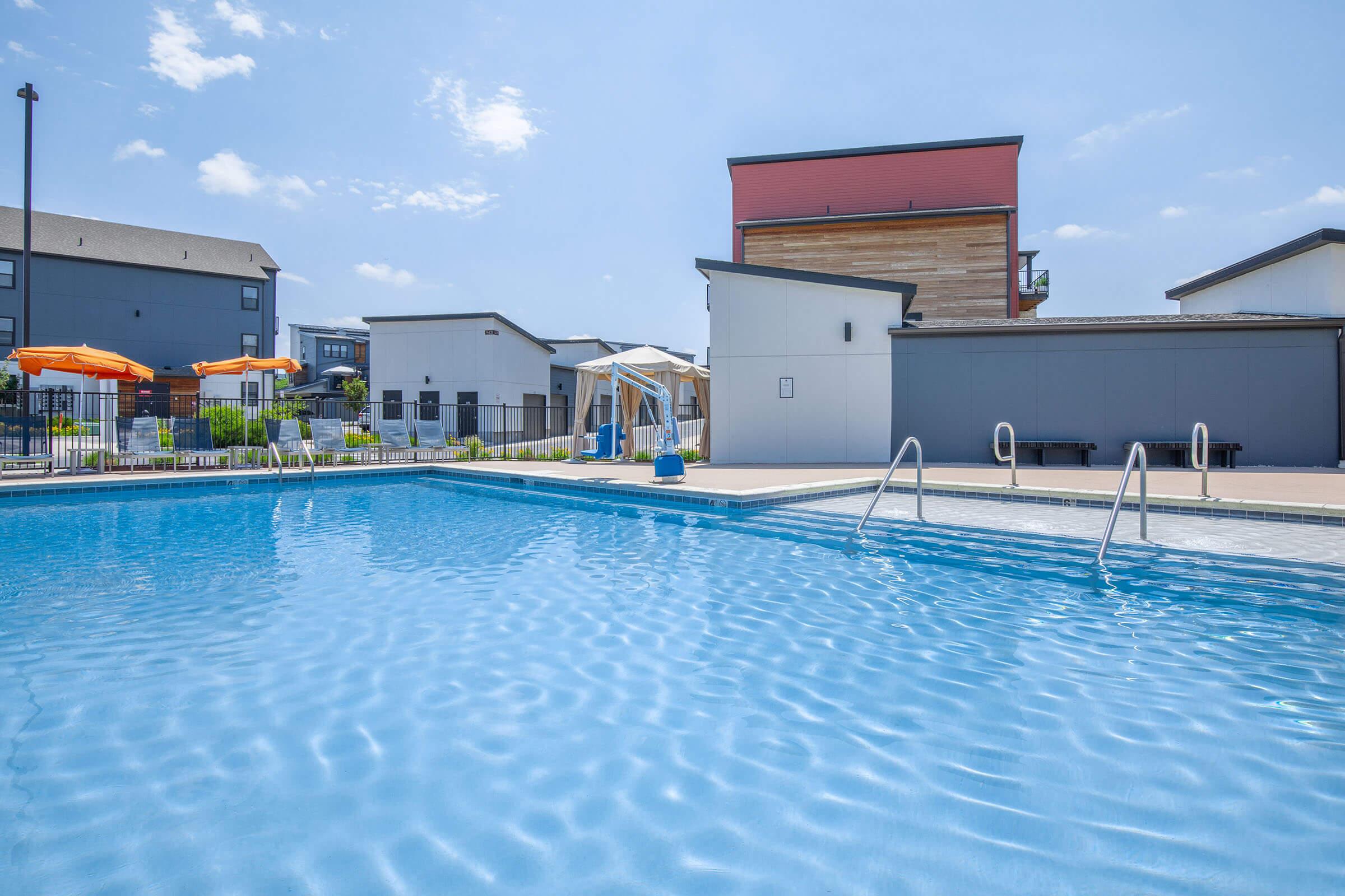 a pool next to a body of water