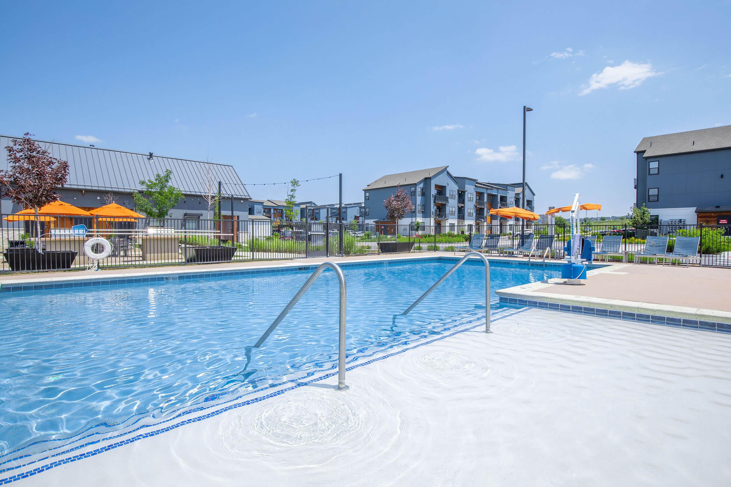 a pool next to a body of water