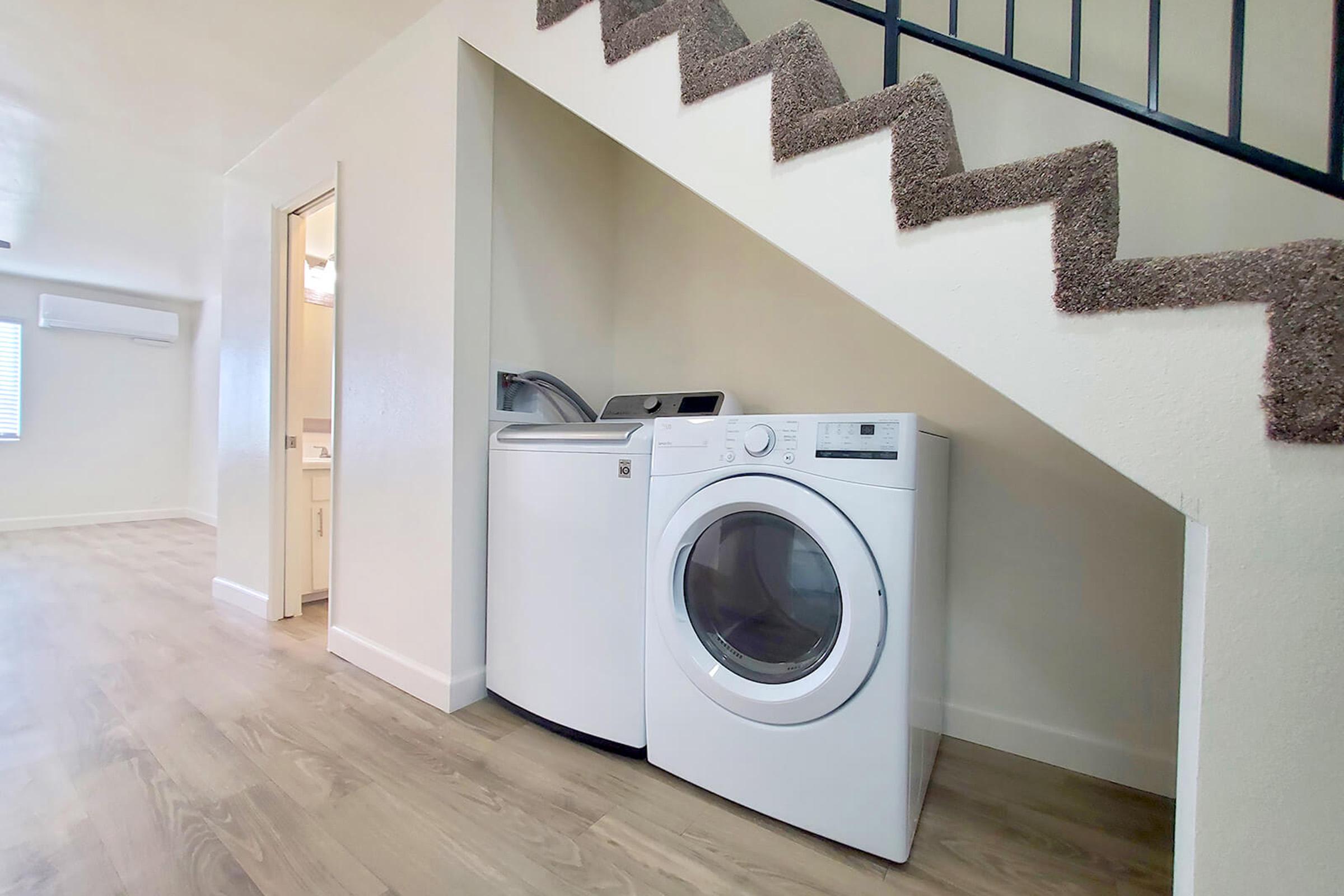 a kitchen with a stove and a refrigerator