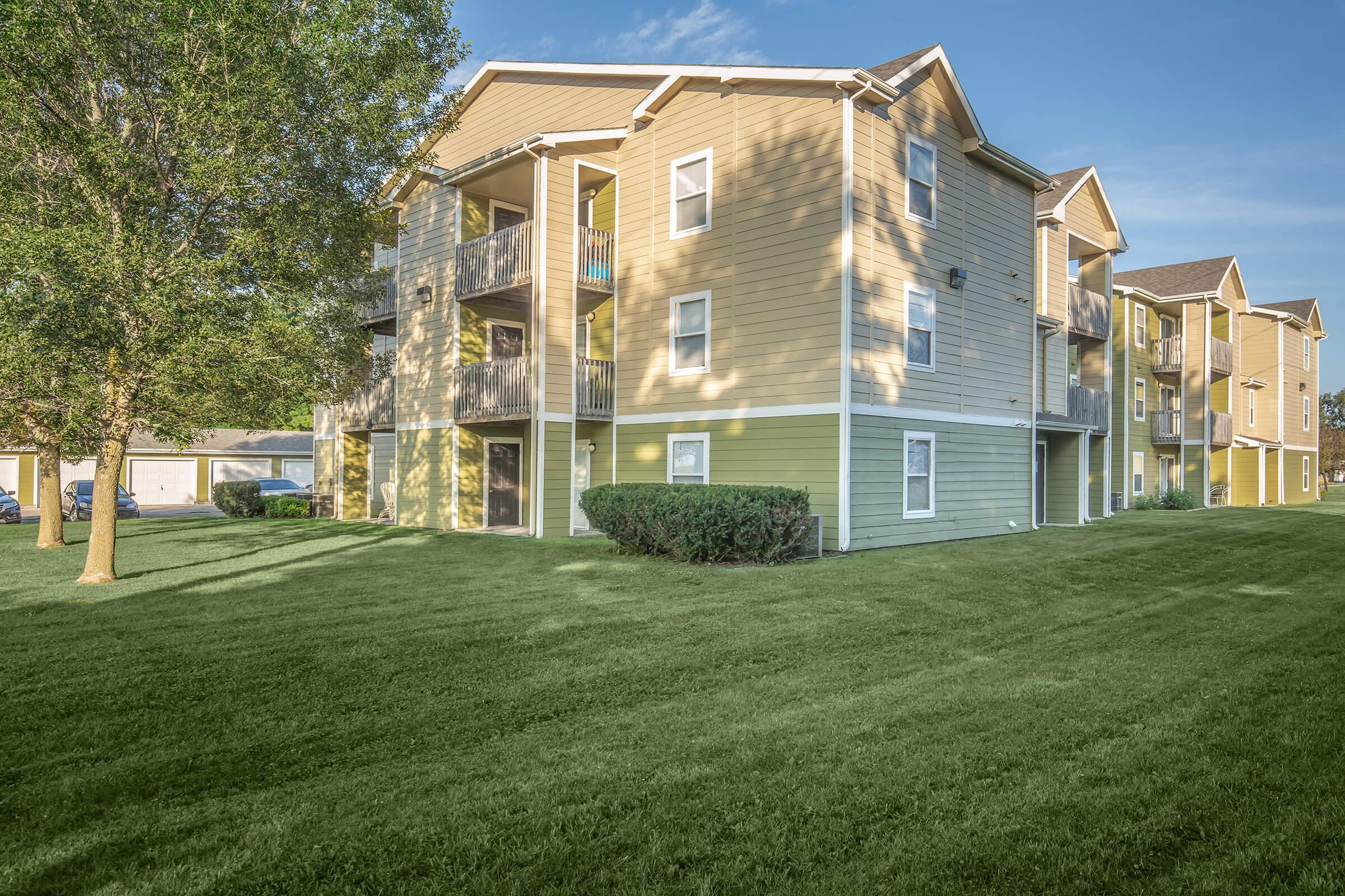 a large lawn in front of a house