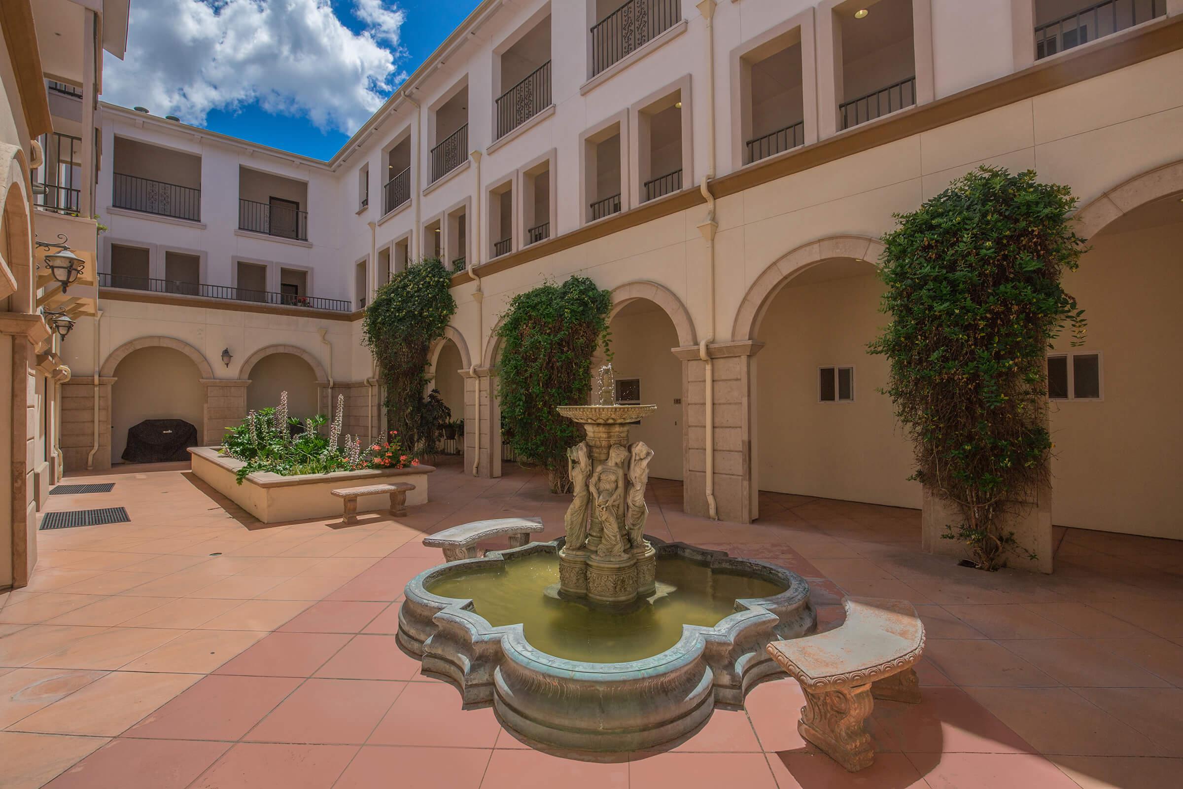 a statue in front of a building