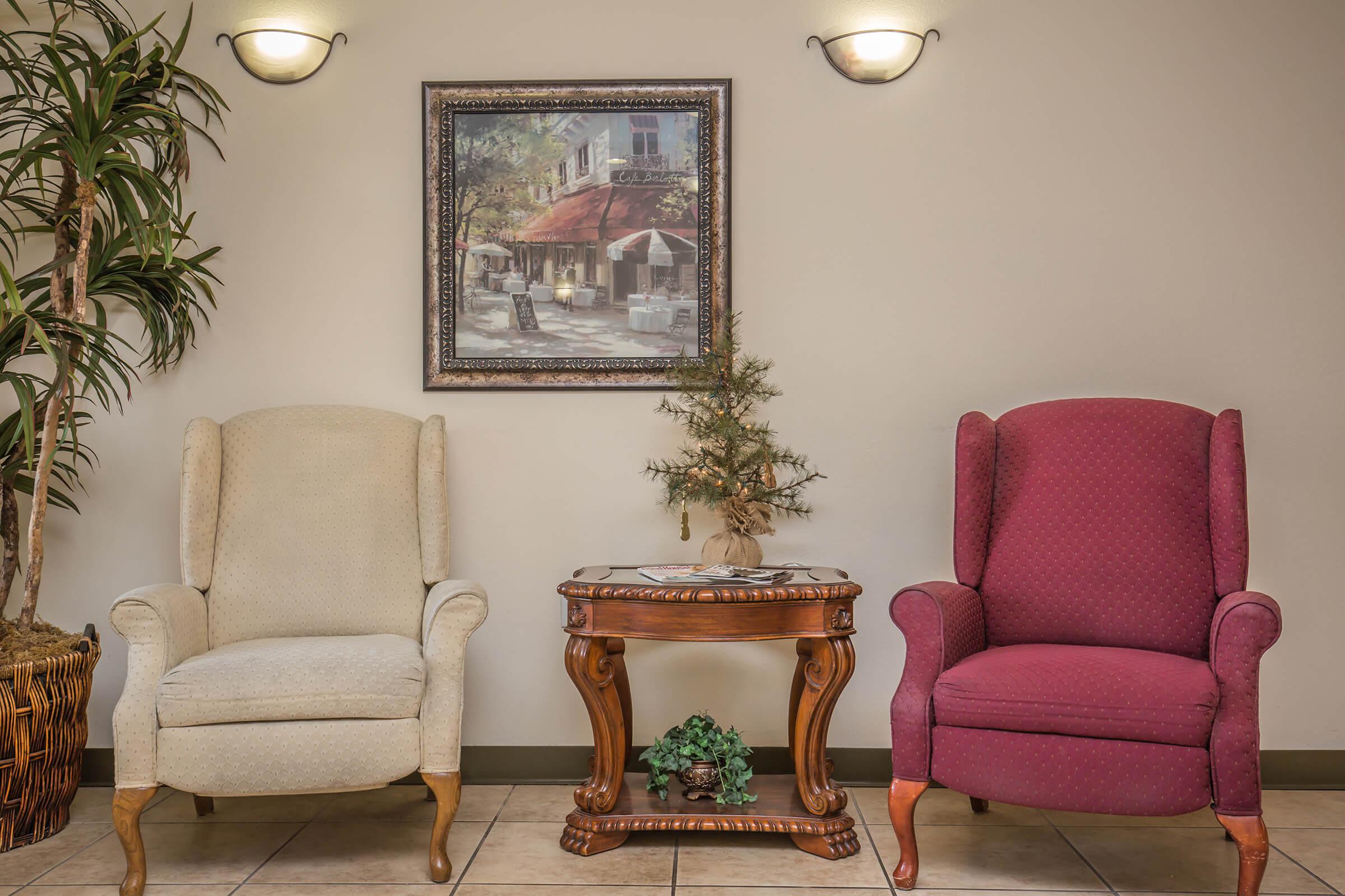 a living room filled with furniture and a fire place