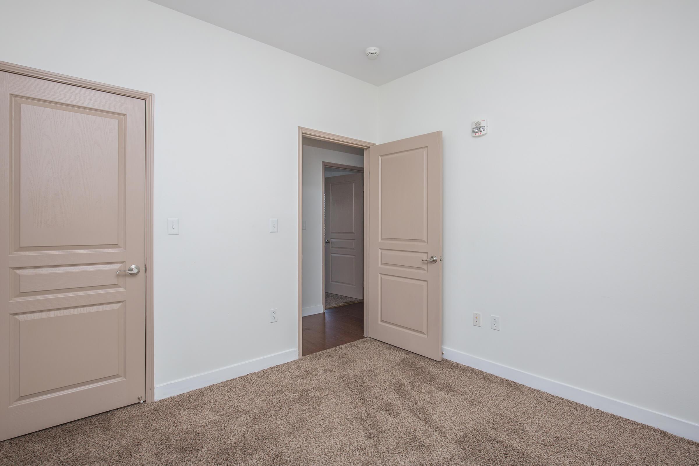 a white refrigerator freezer sitting in a room