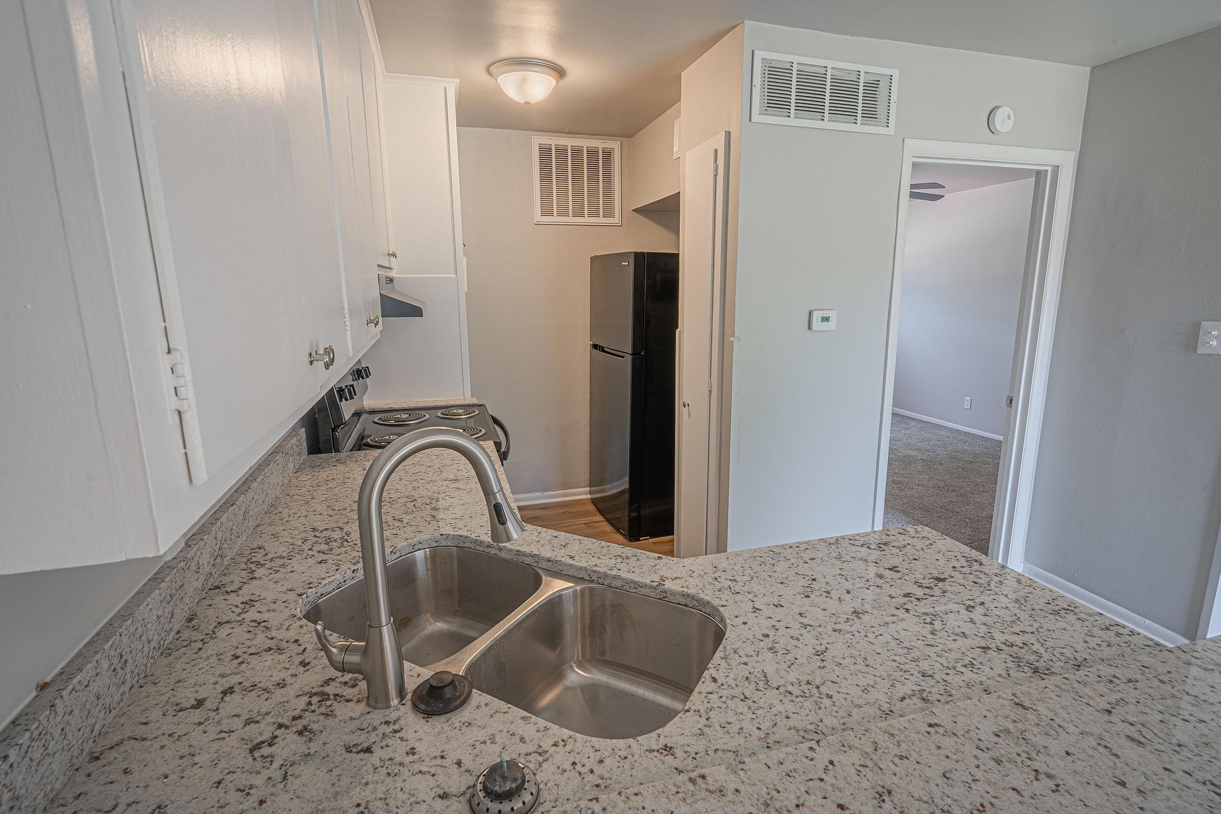 a close up of a sink in a small room