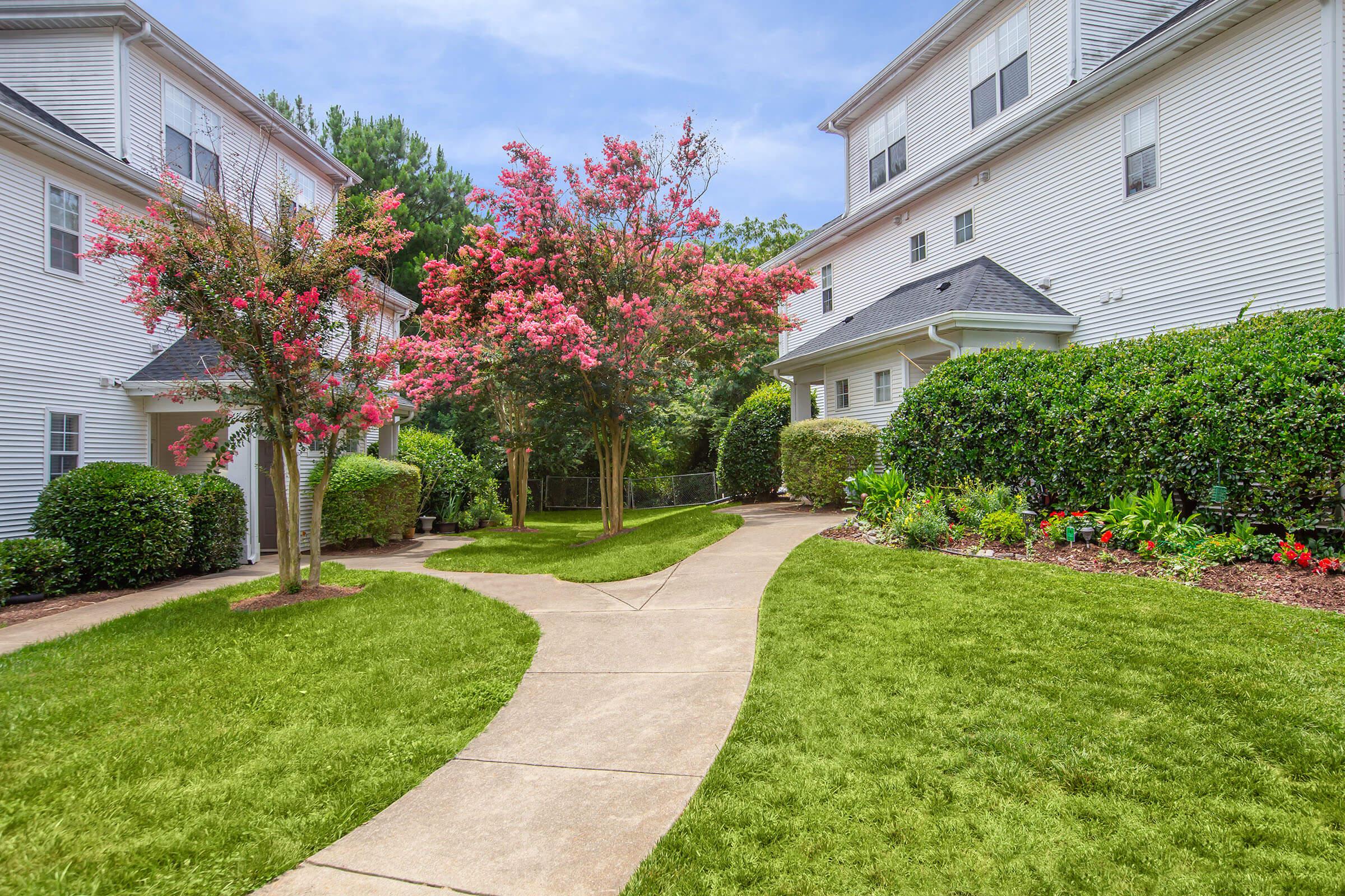 a large lawn in front of a house