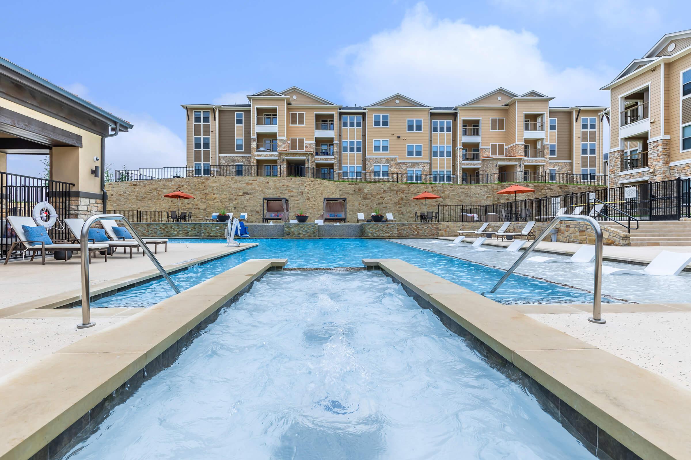 a pool next to a building