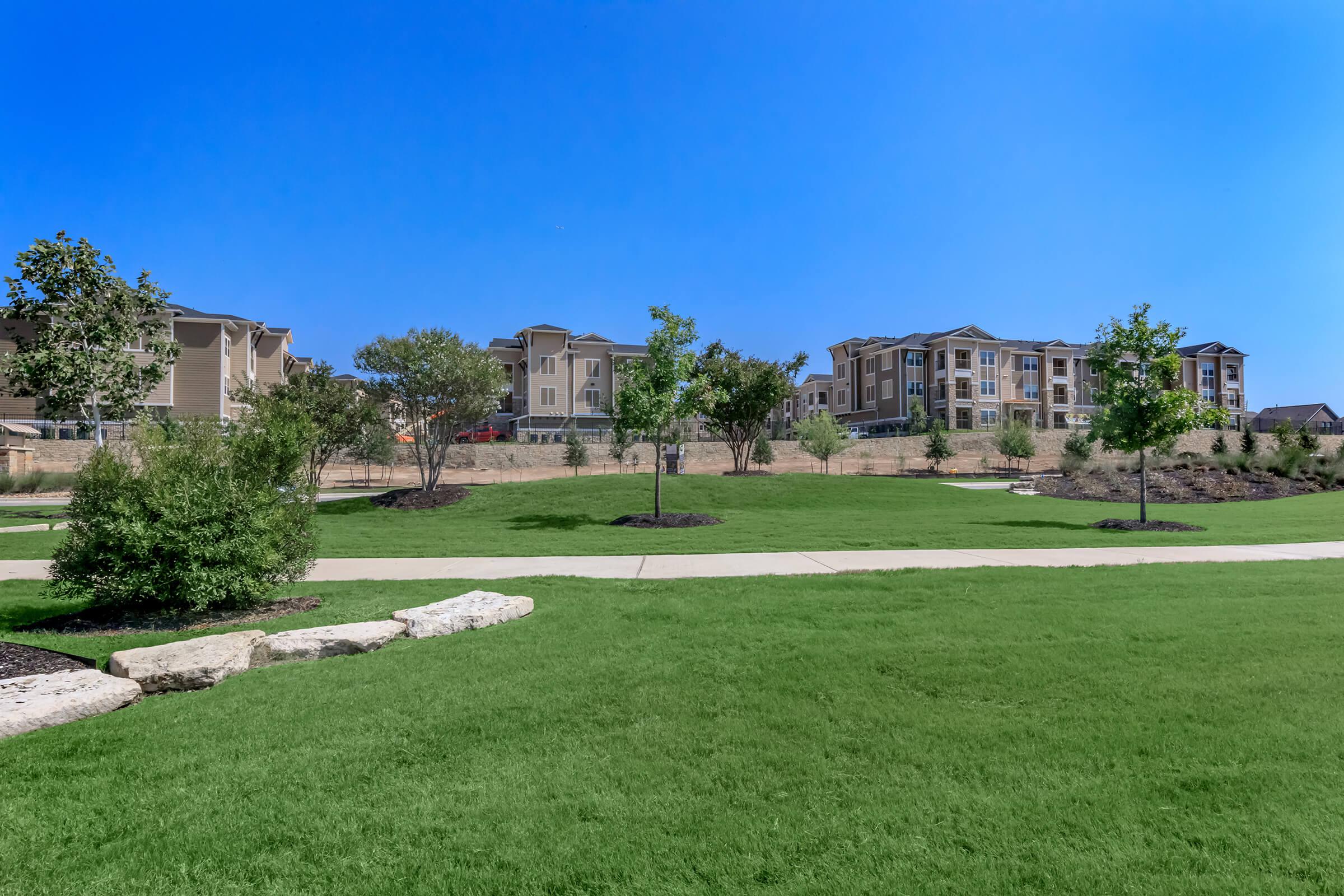 a large lawn in front of a house