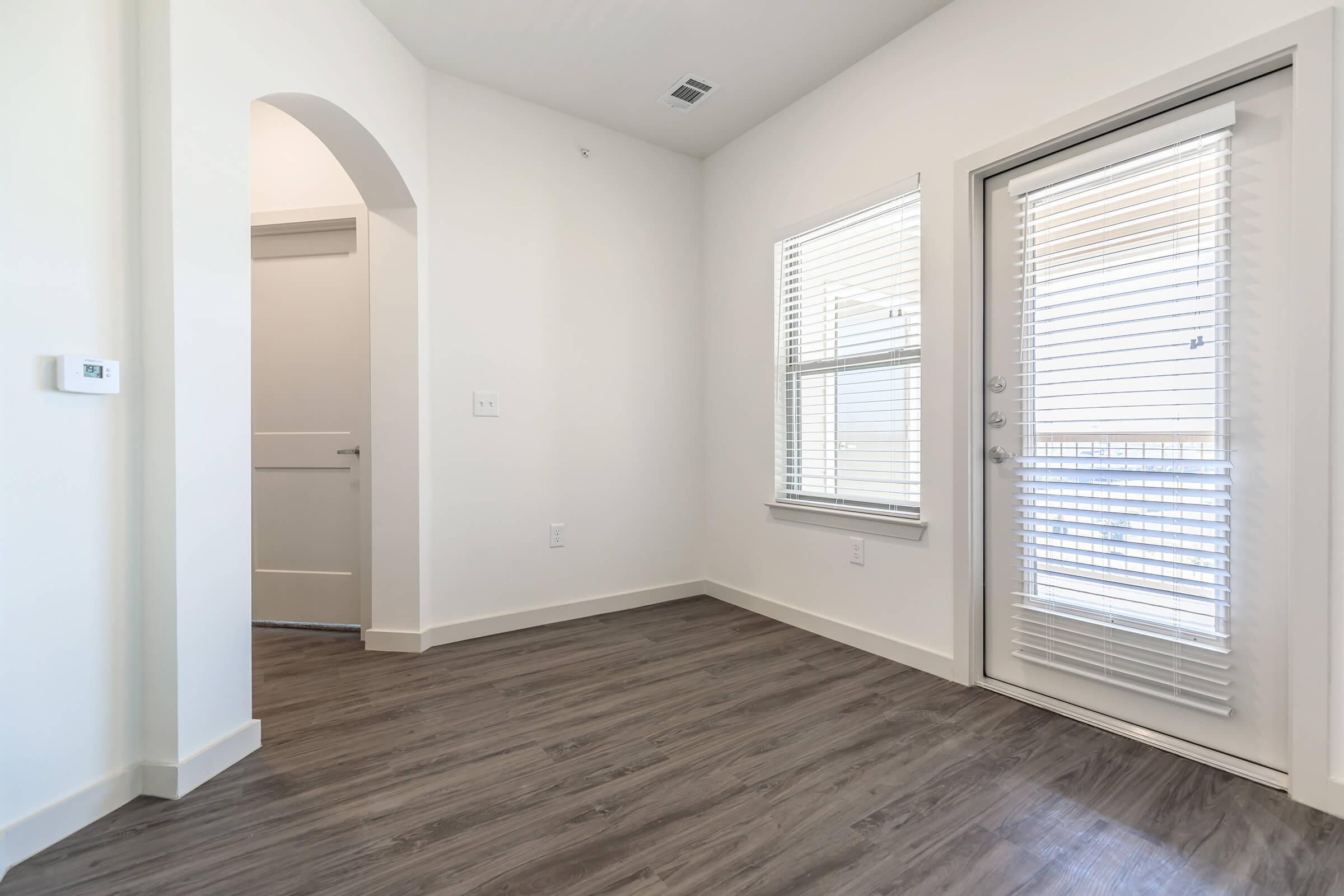 a room with a sink and a window