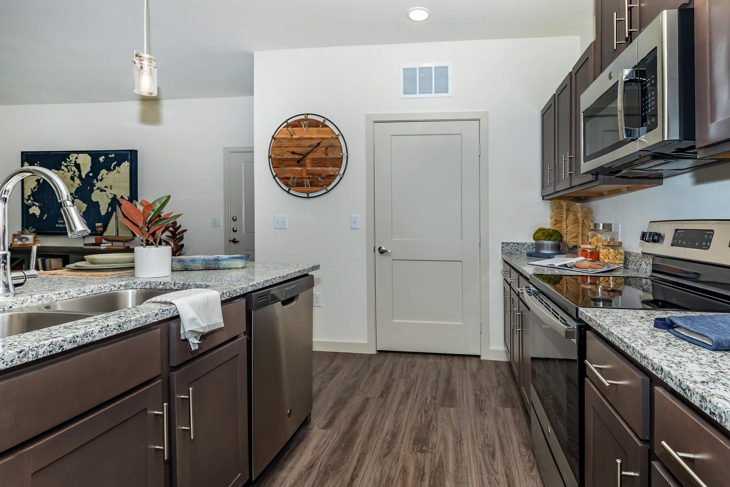 a kitchen with a sink and a counter