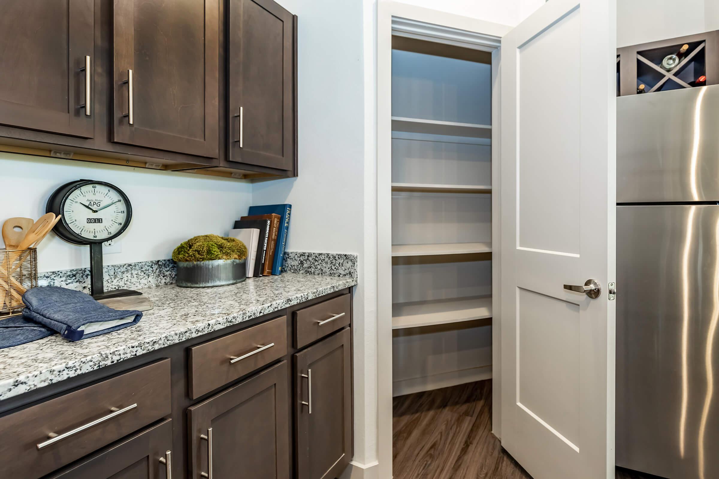 a stainless steel refrigerator in a kitchen