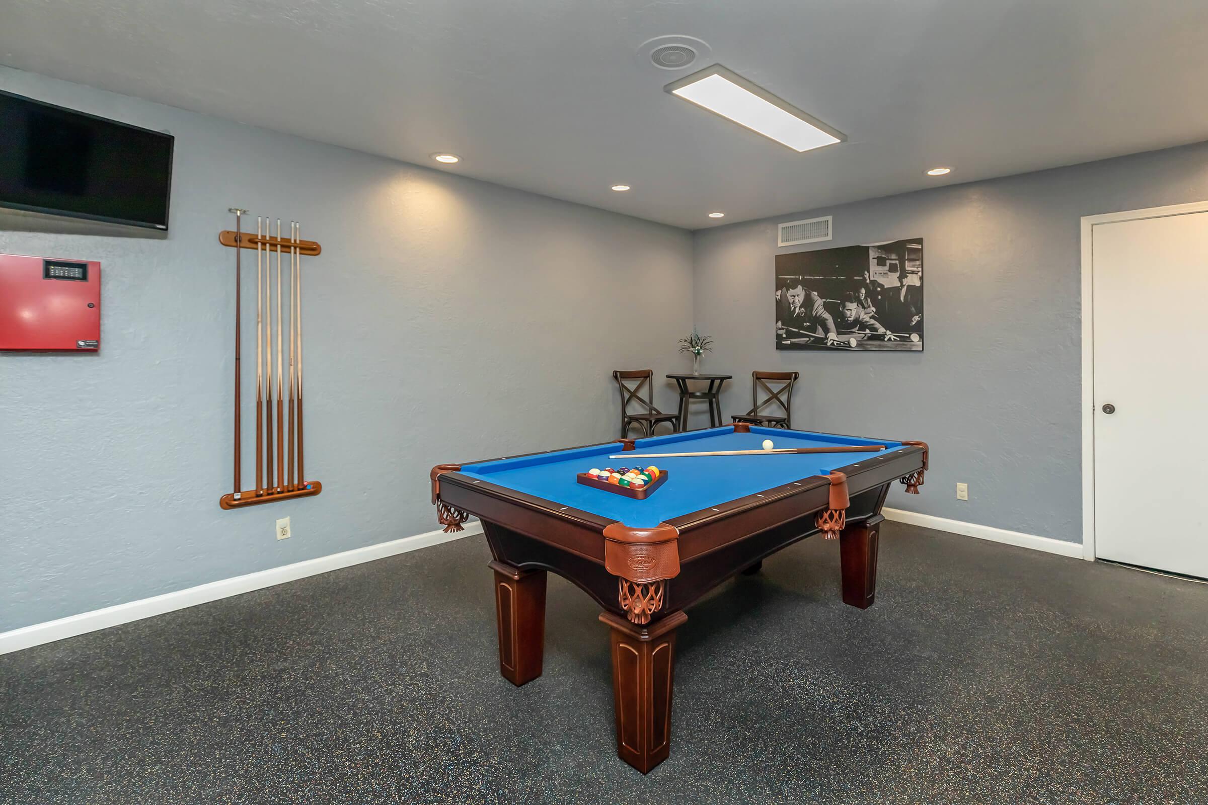 a pool table in a community room