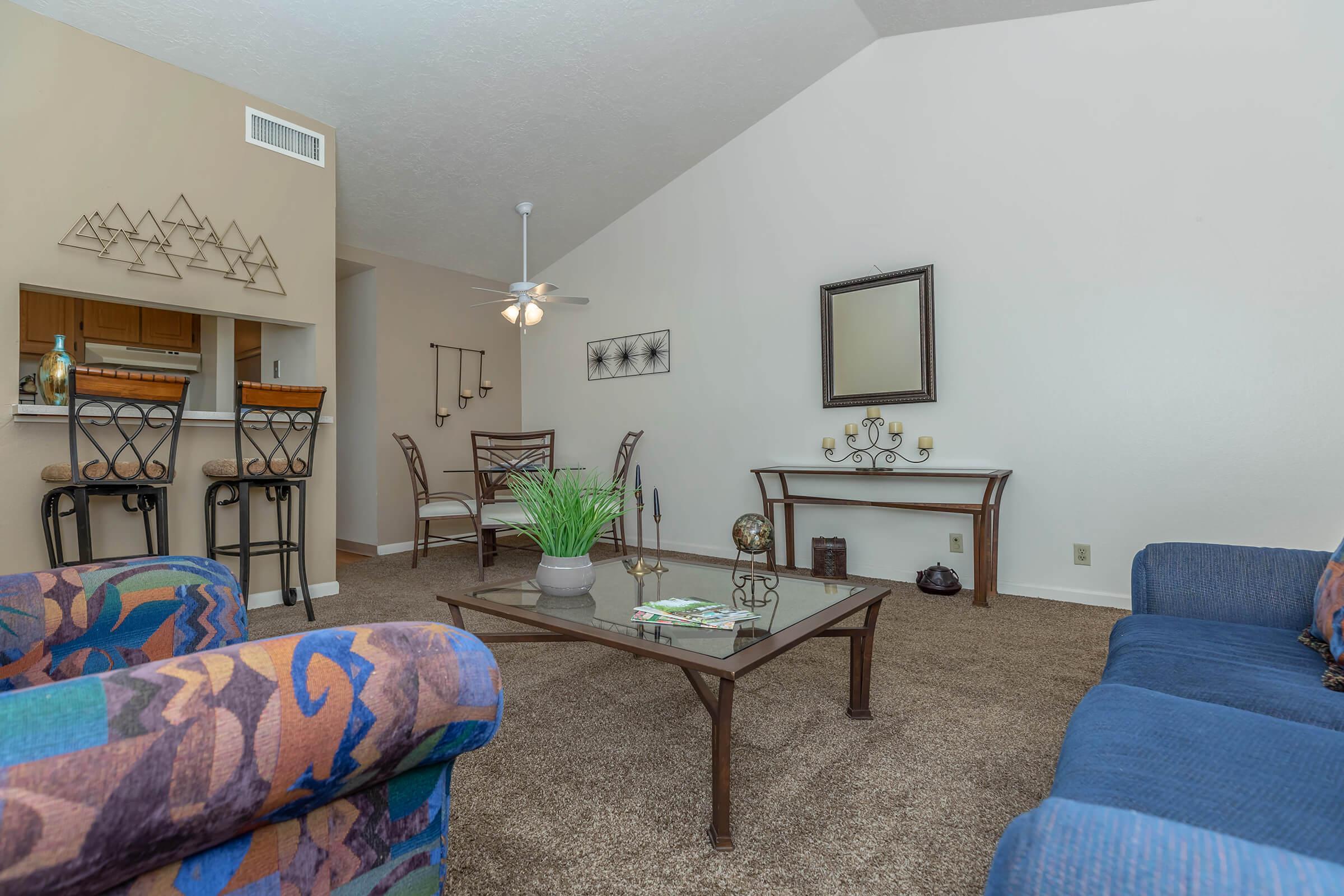 living room with a glass coffee table