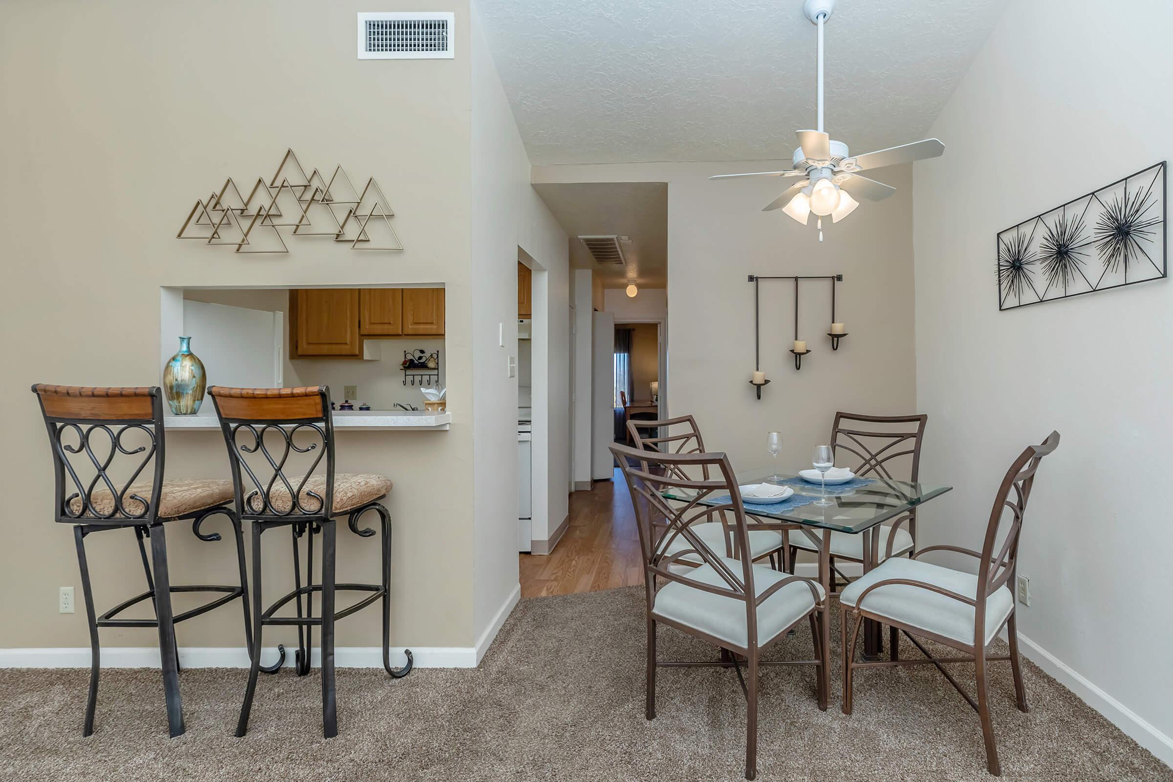 dining room with a ceiling fan