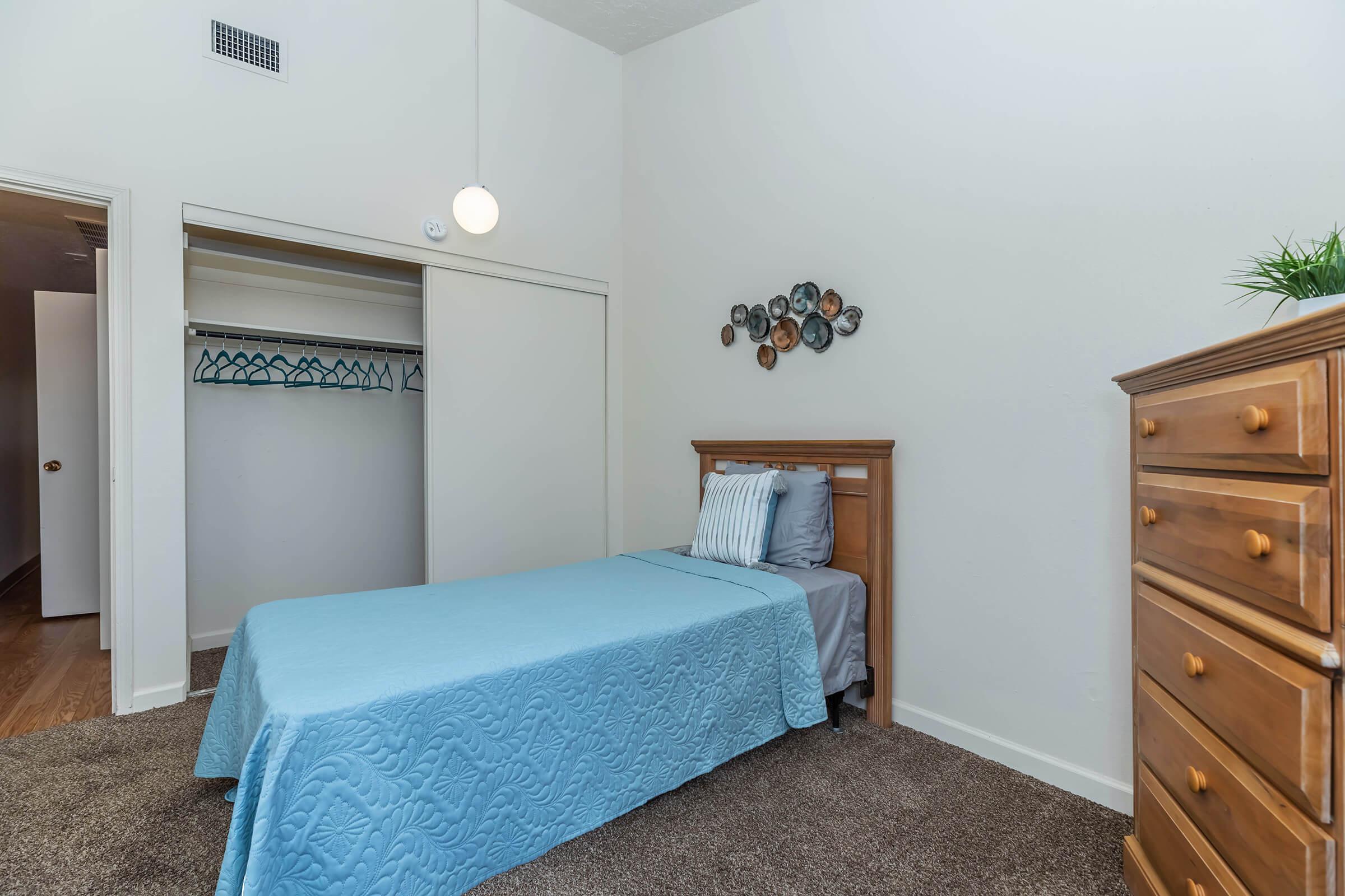 bedroom with sliding closet doors