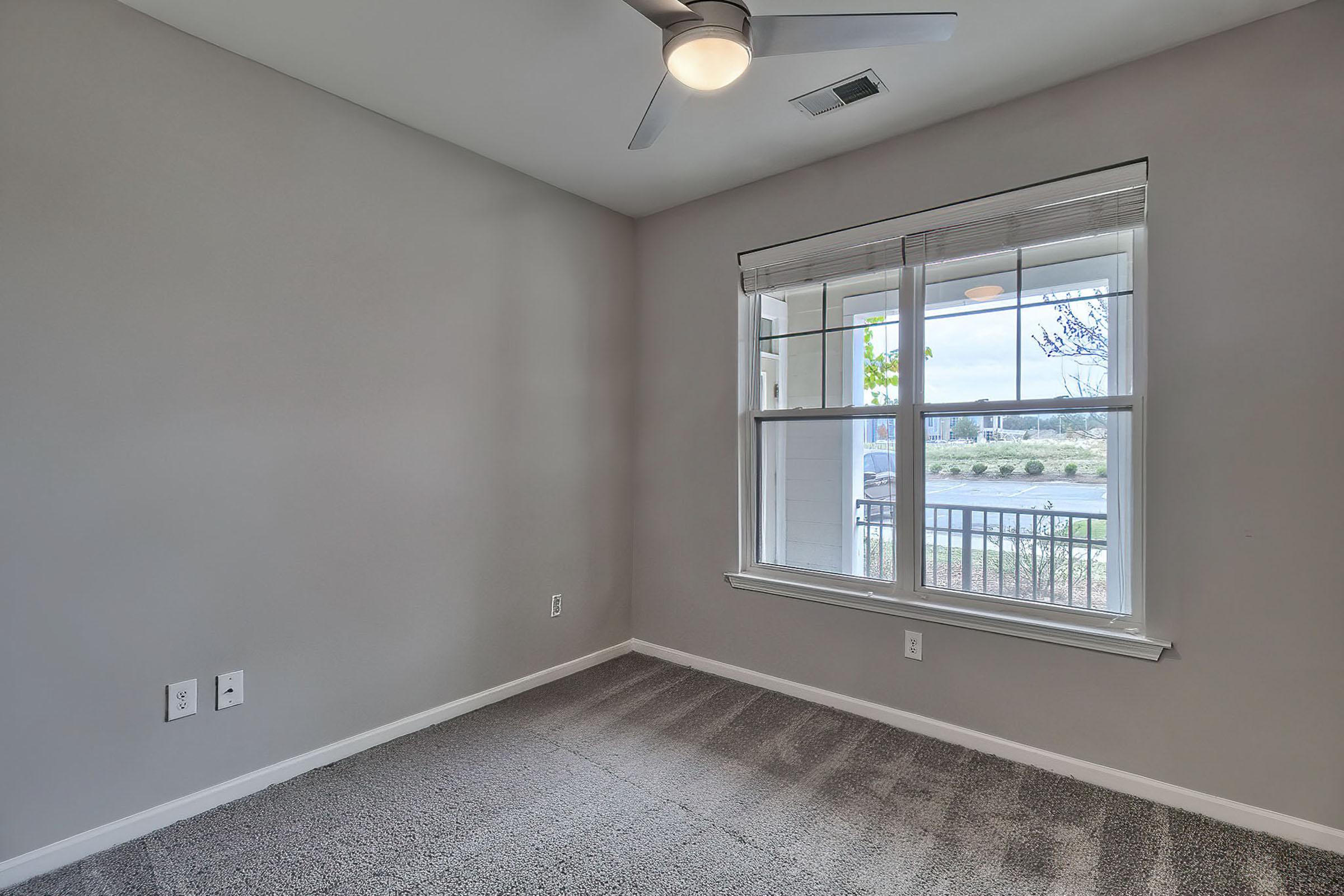 a room with a sink and a window