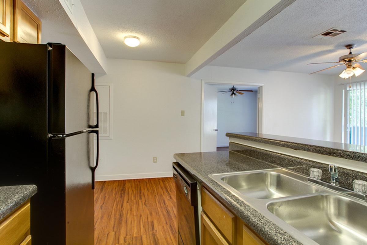 a large kitchen with stainless steel appliances