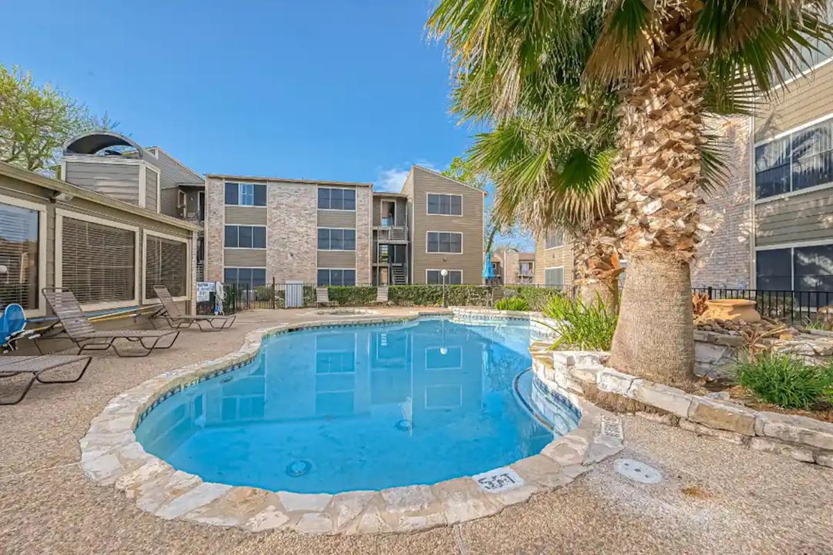 a pool in front of a building