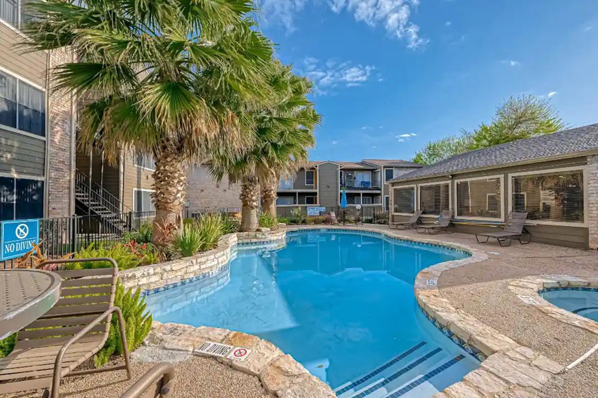 a pool next to a building