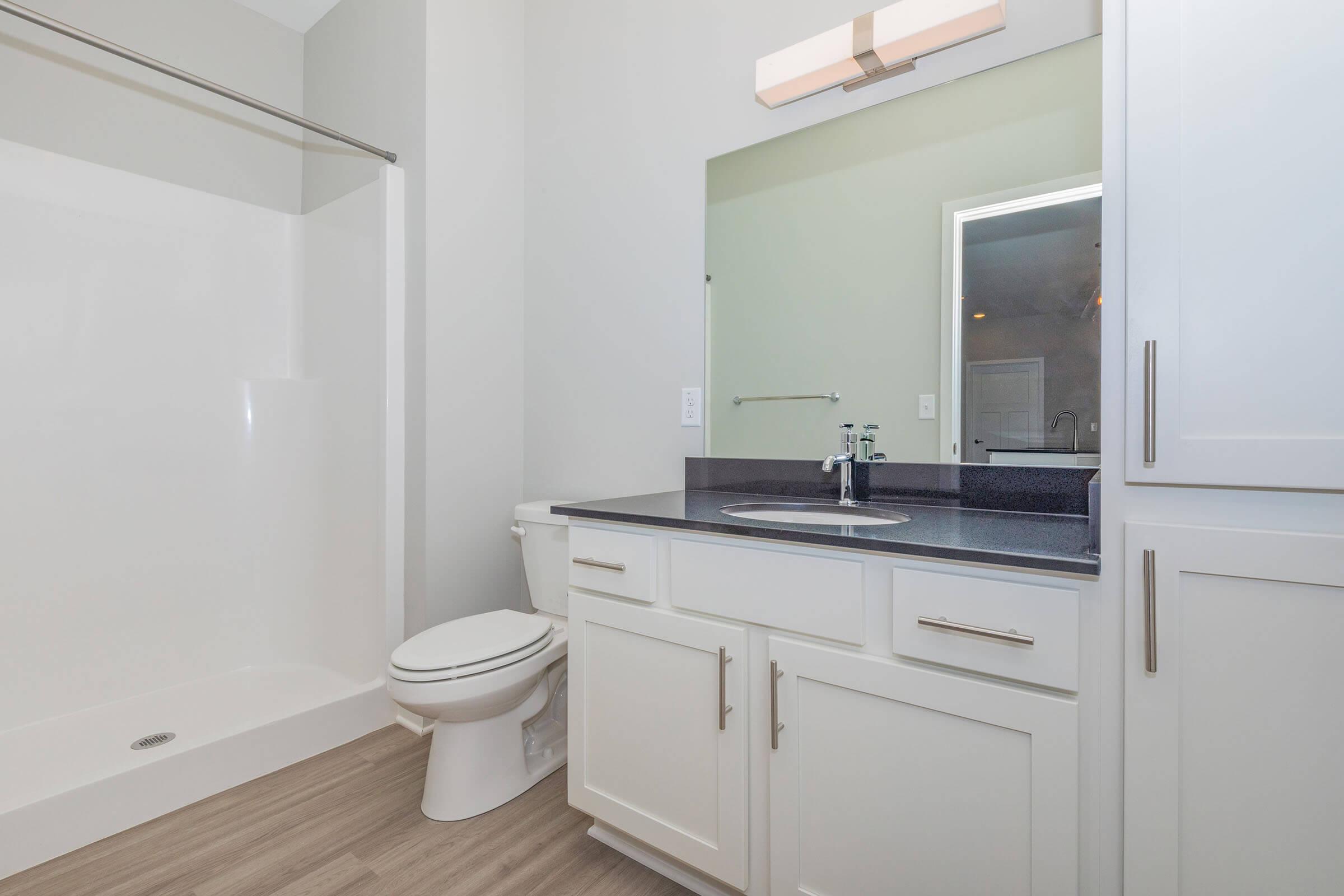 a kitchen with a sink and a refrigerator