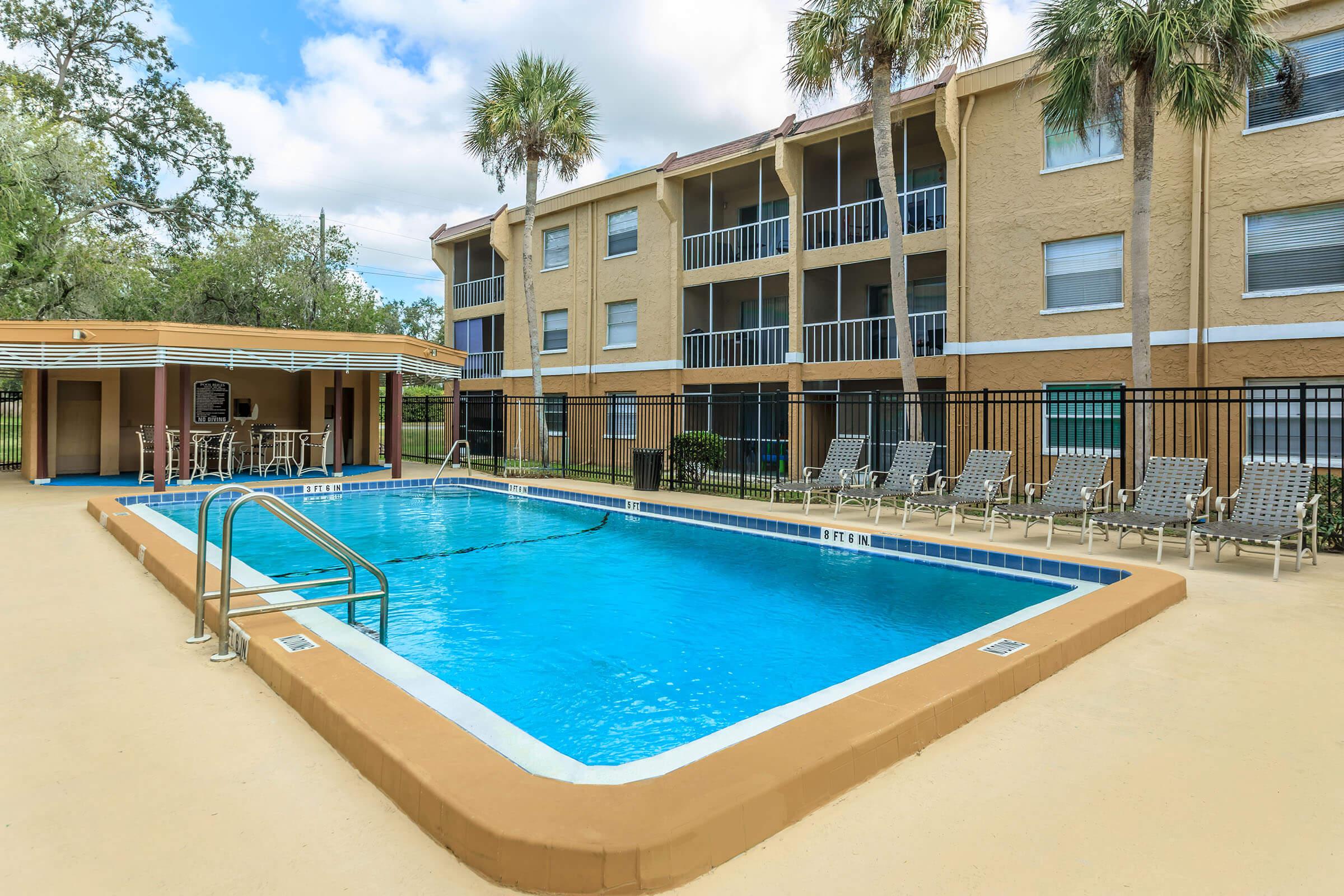 RELAX BESIDE OUR SPARKLING SWIMMING POOL