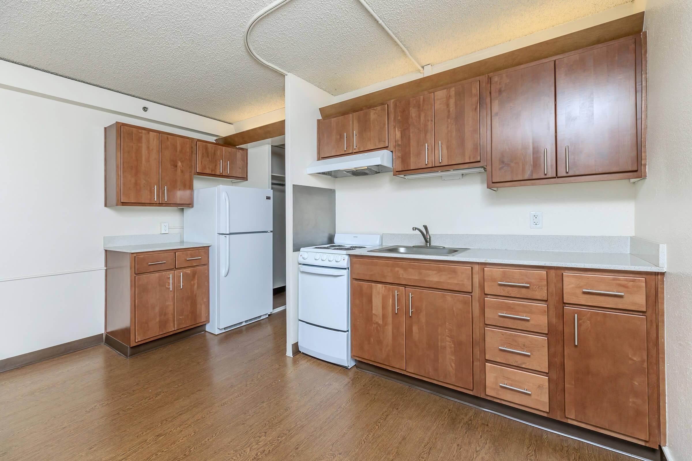 Kitchen with brown cabinets