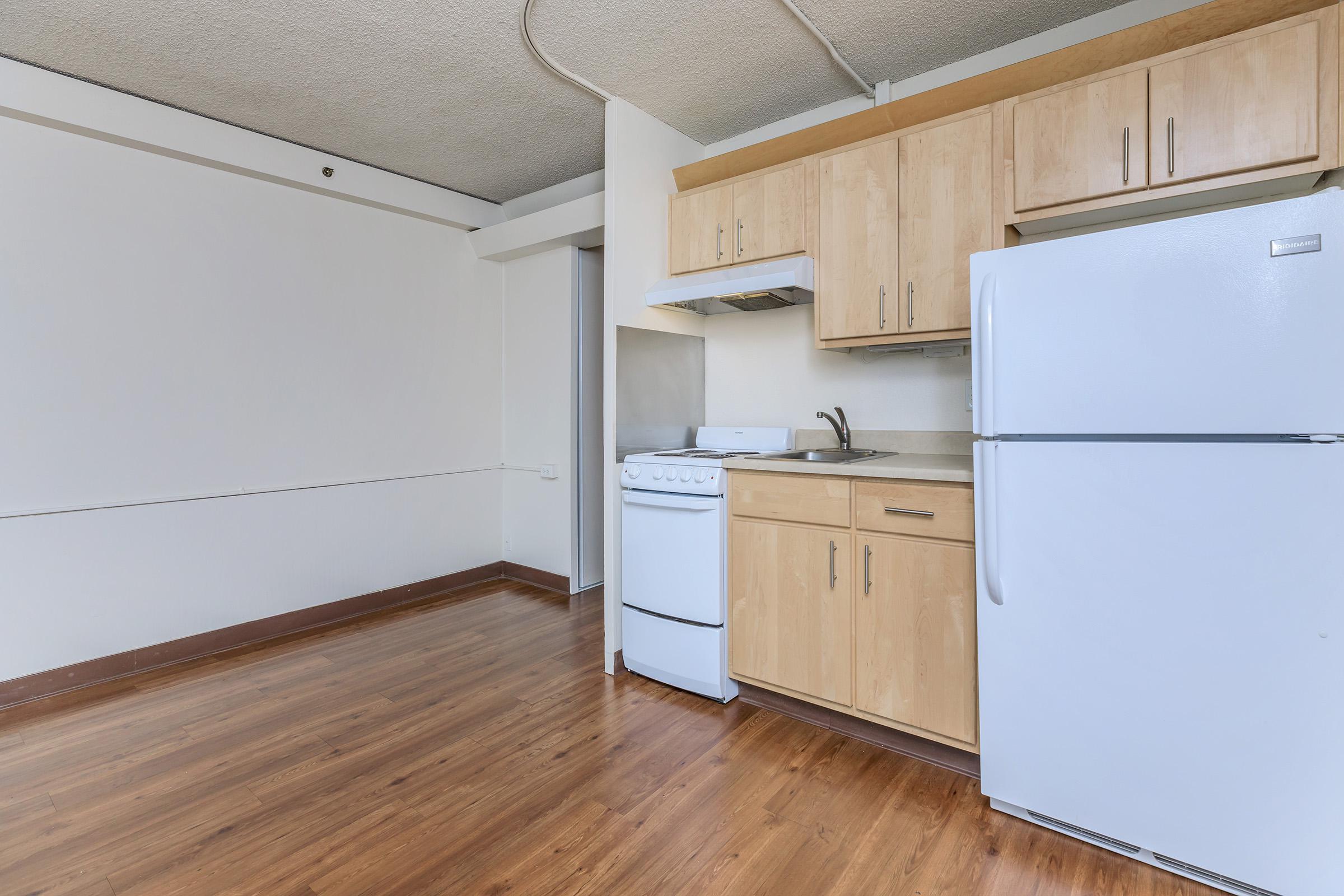 Kitchen with wooden cabinets