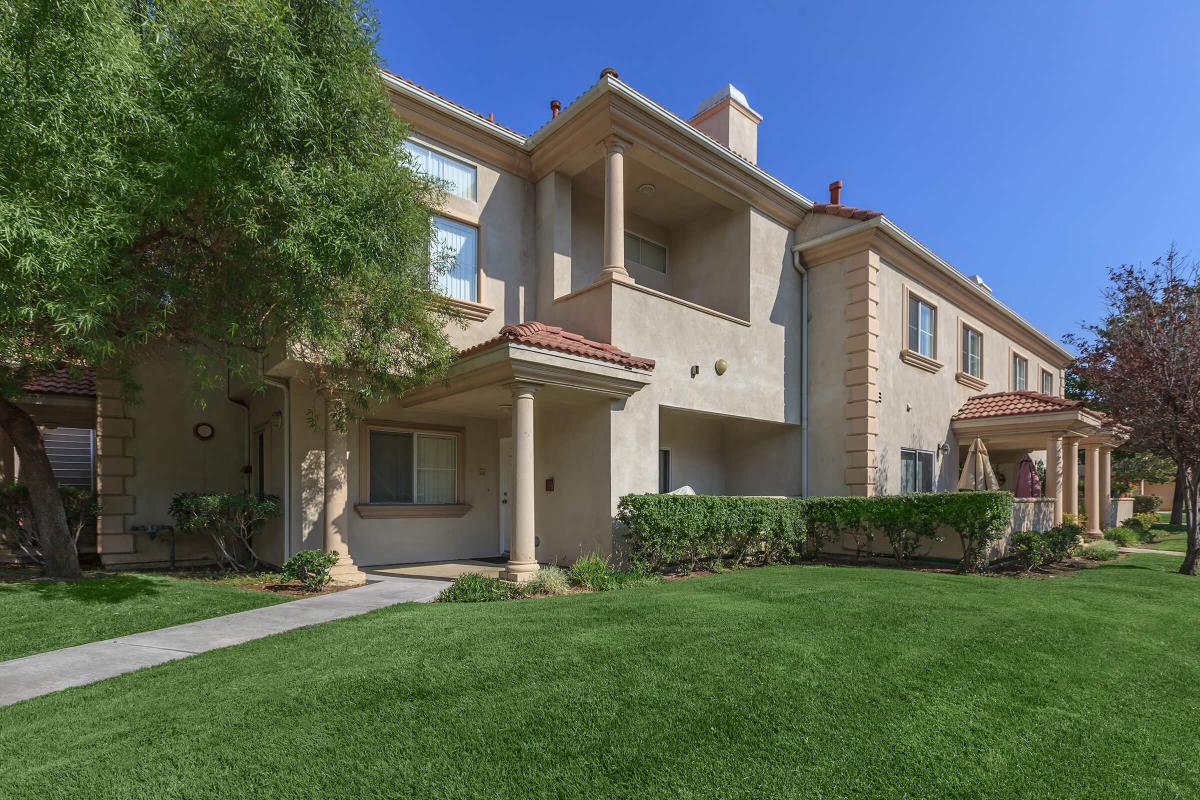 a large lawn in front of a house