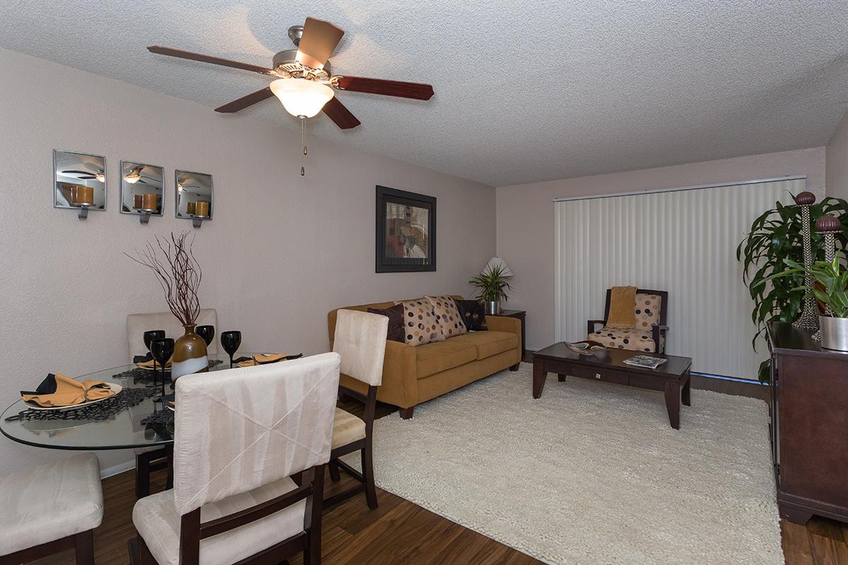 a living room filled with lots of furniture