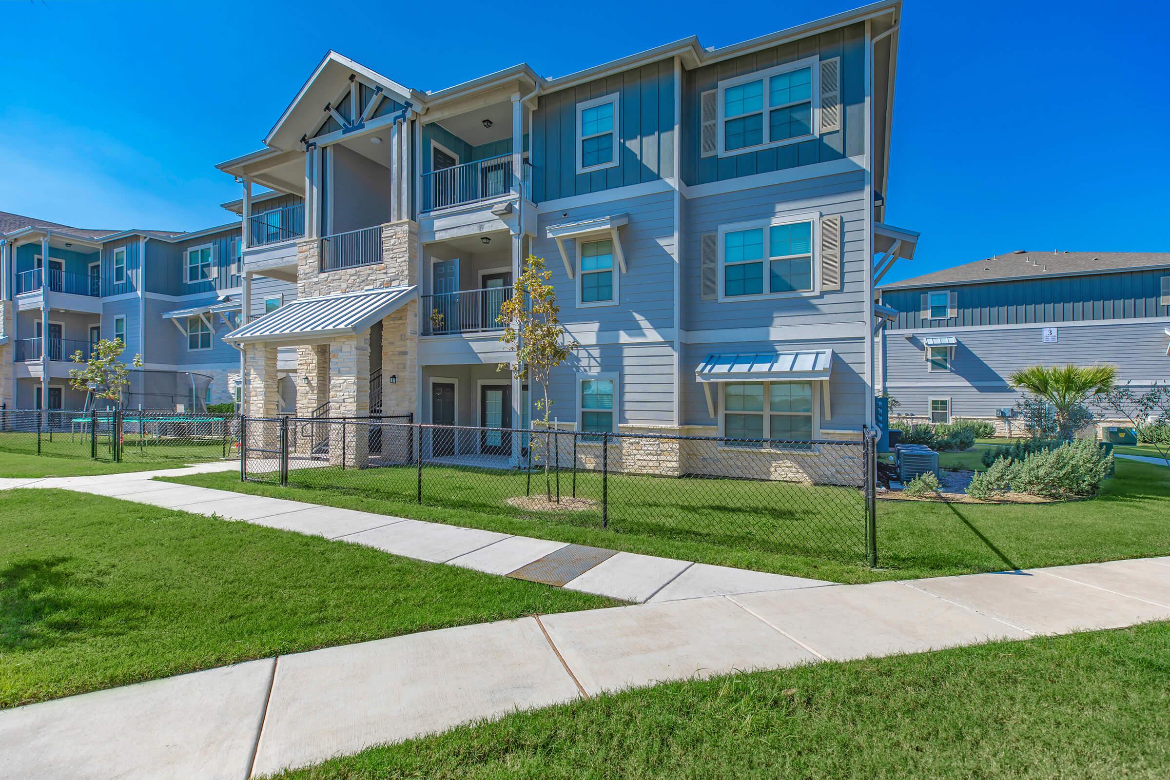 a large lawn in front of a building