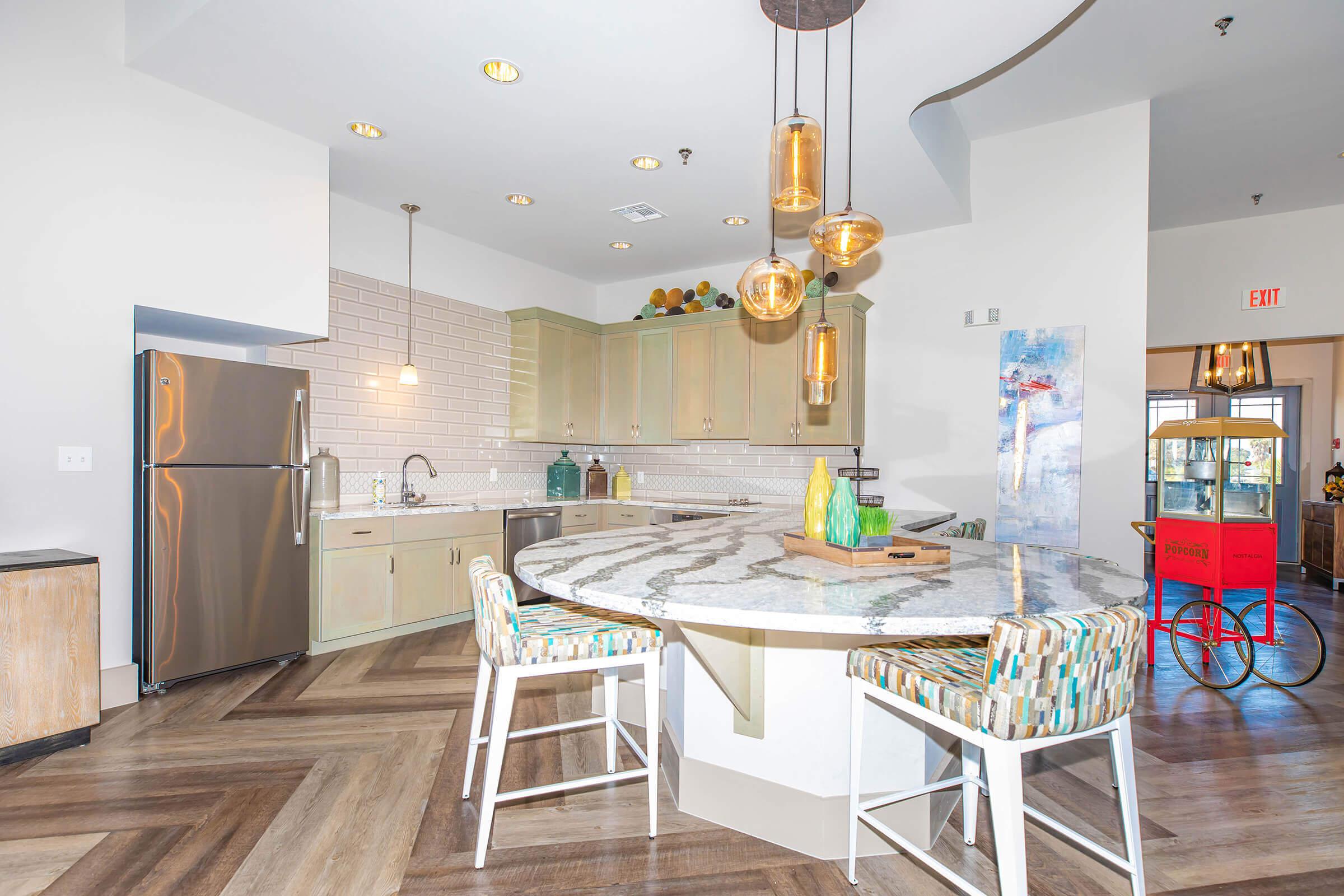 a kitchen with a dining room table