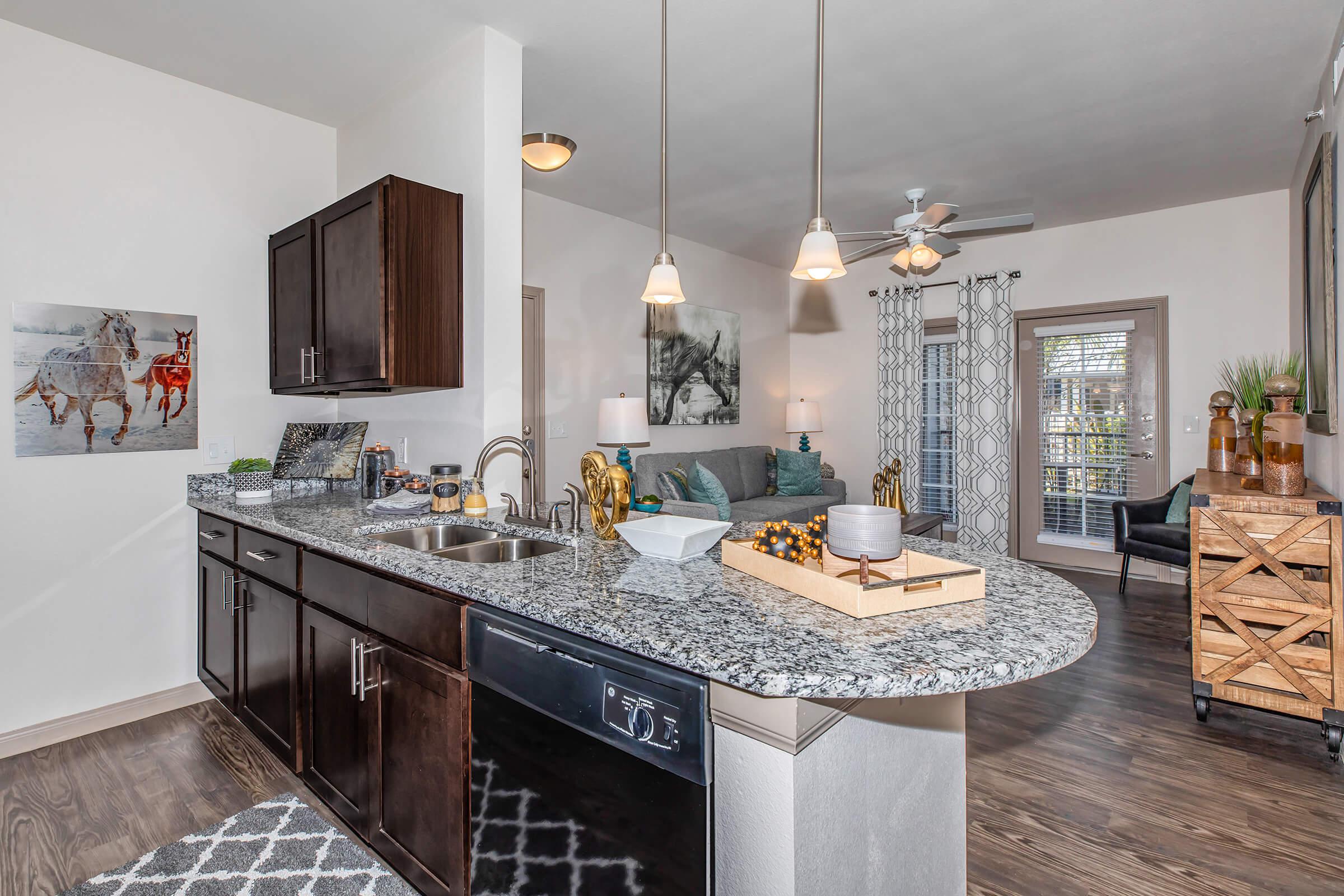 a kitchen with a sink and a window