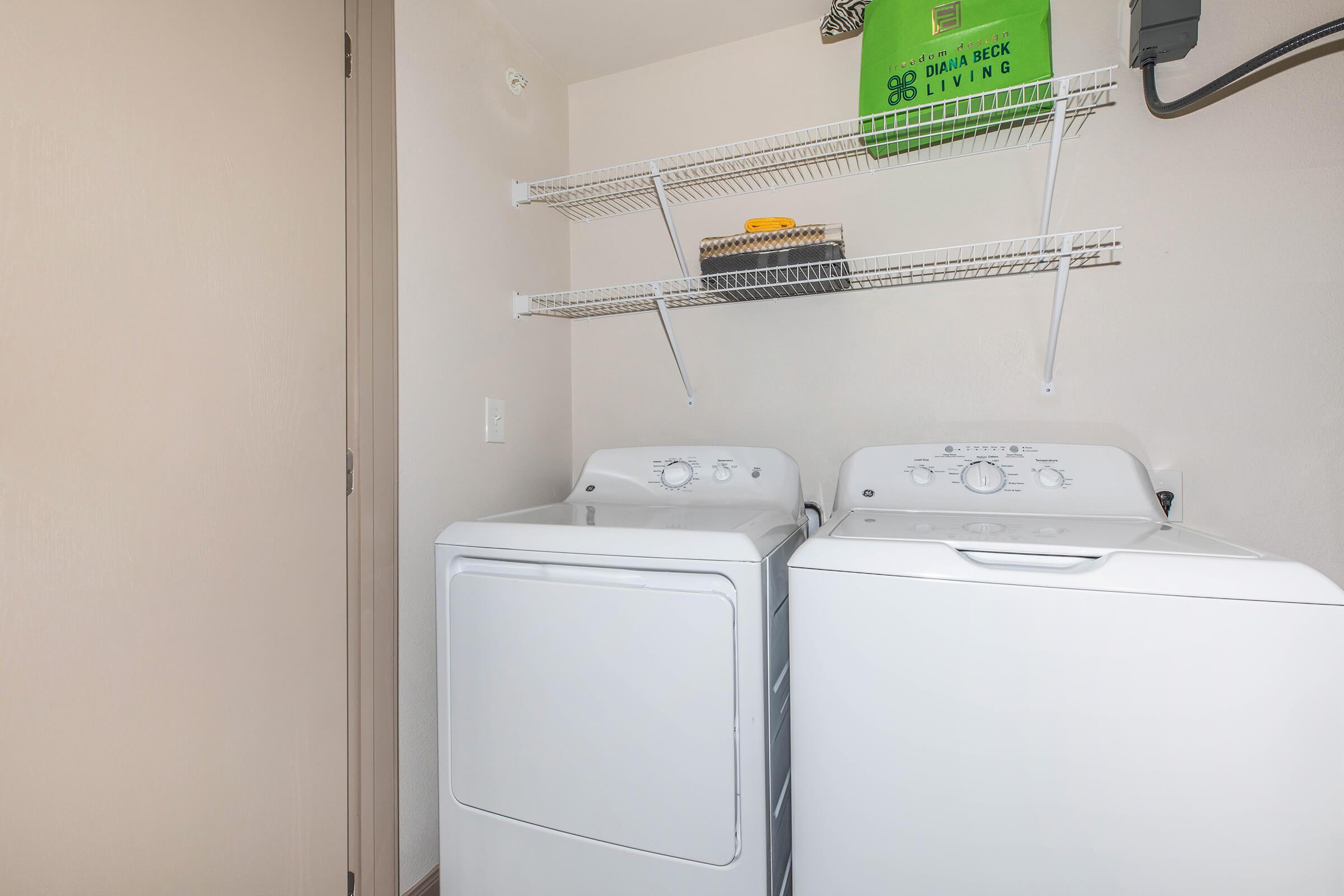 a white refrigerator freezer sitting in a room