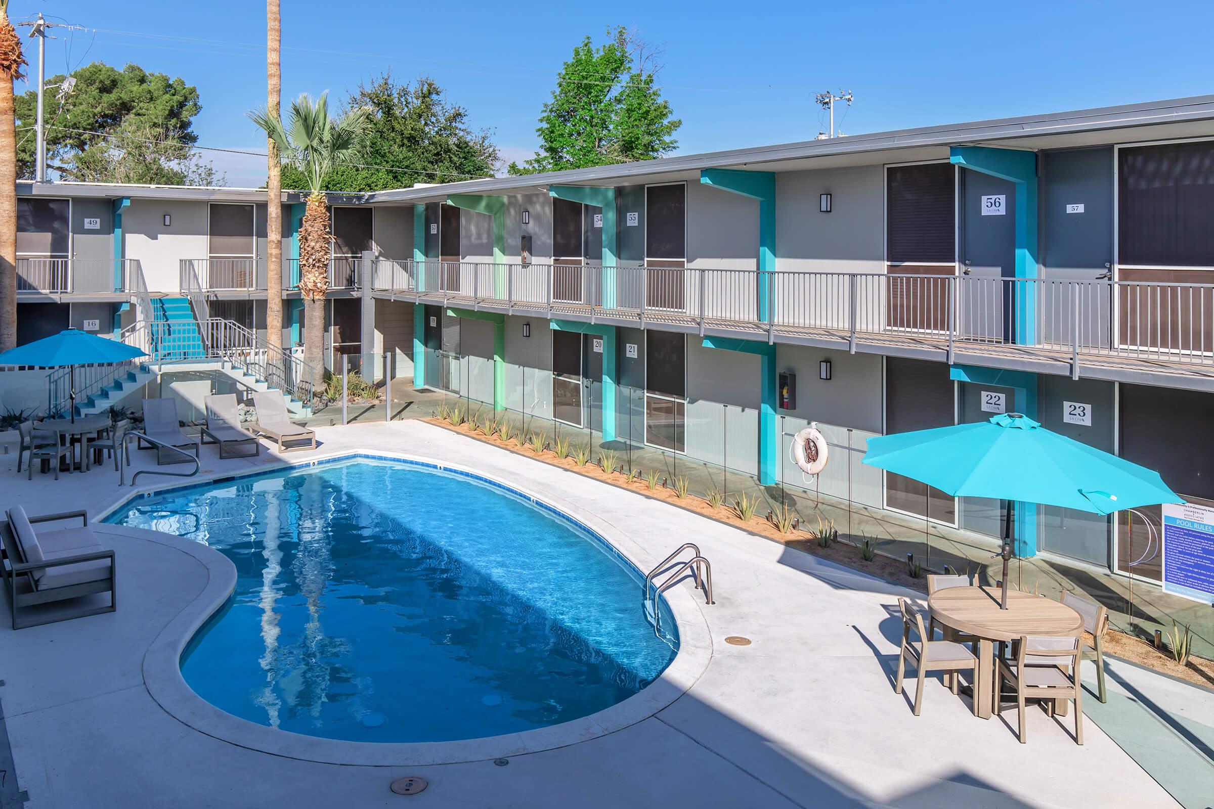 a pool next to a building