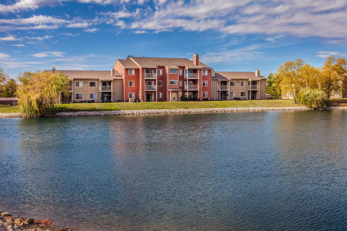 a building next to a body of water