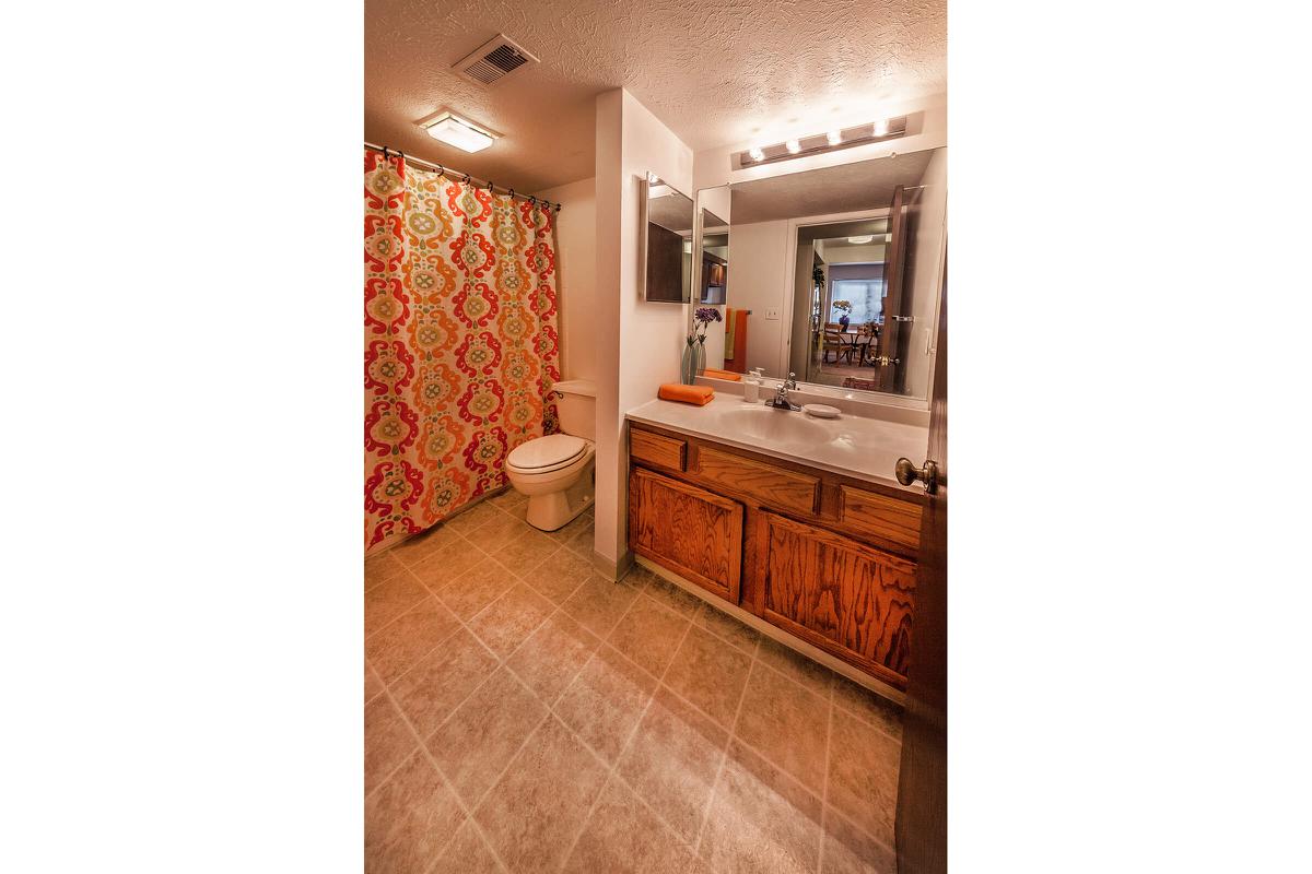 a kitchen with a tile floor