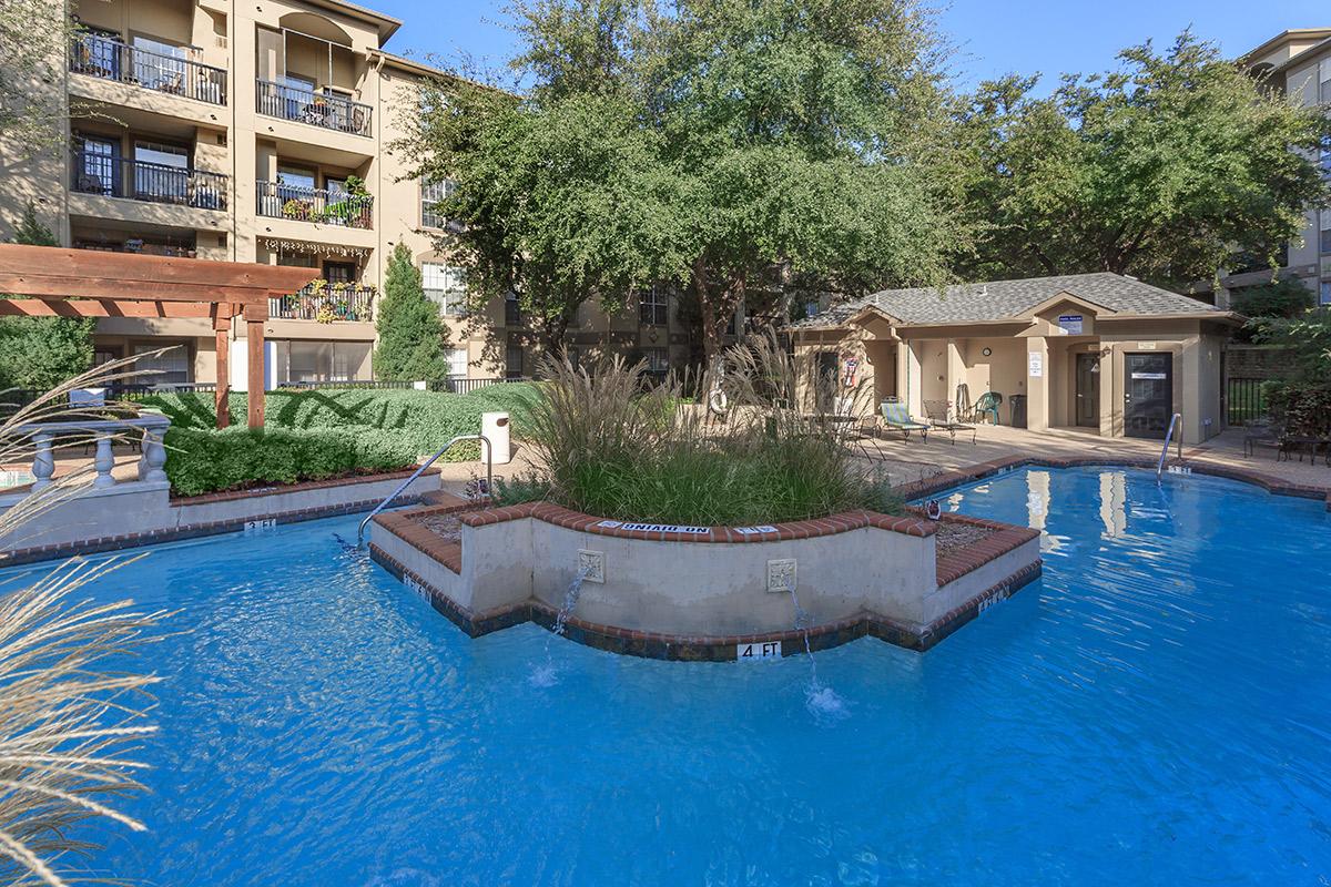 a small house in a pool of water