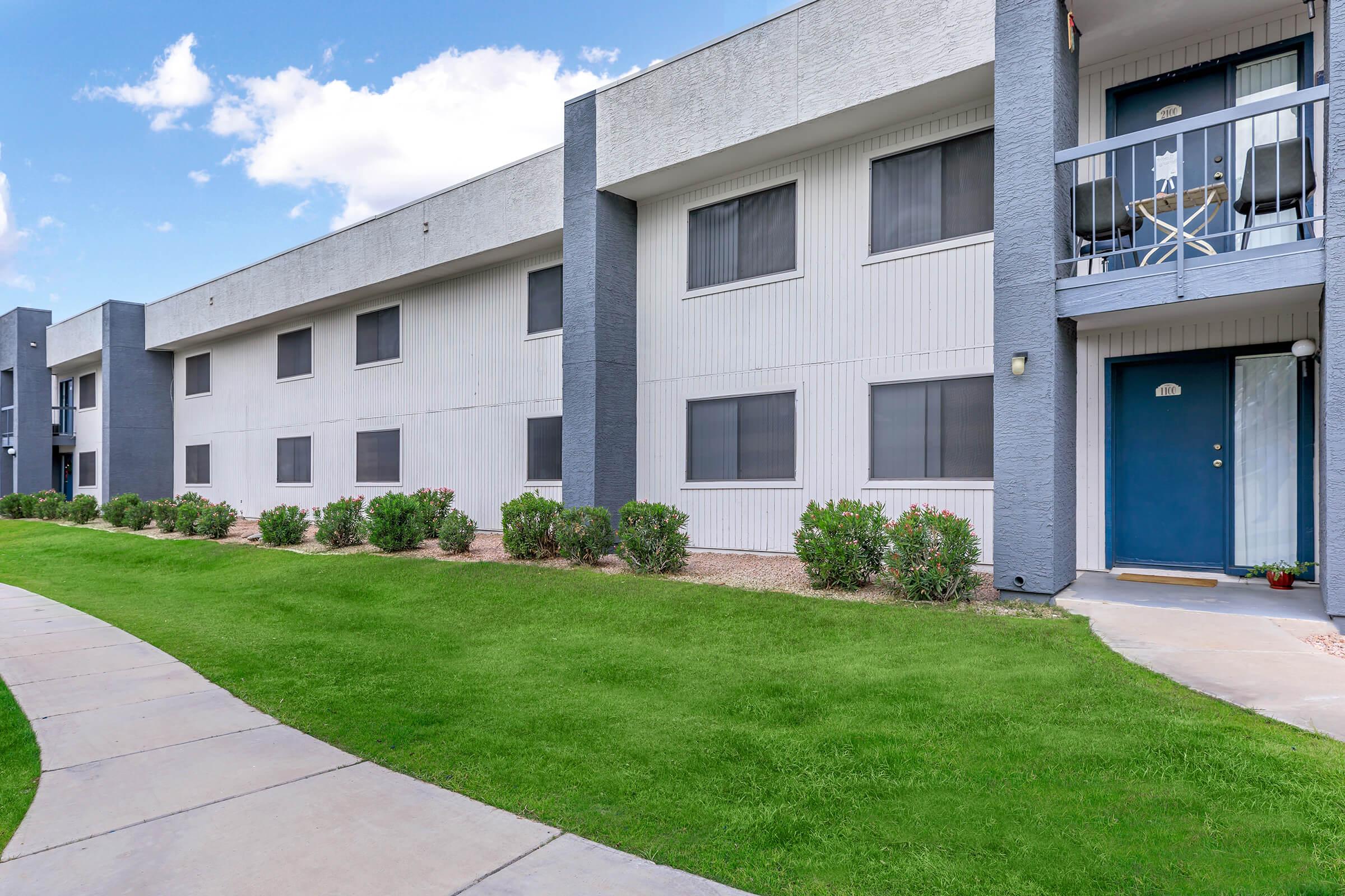 a large lawn in front of a building