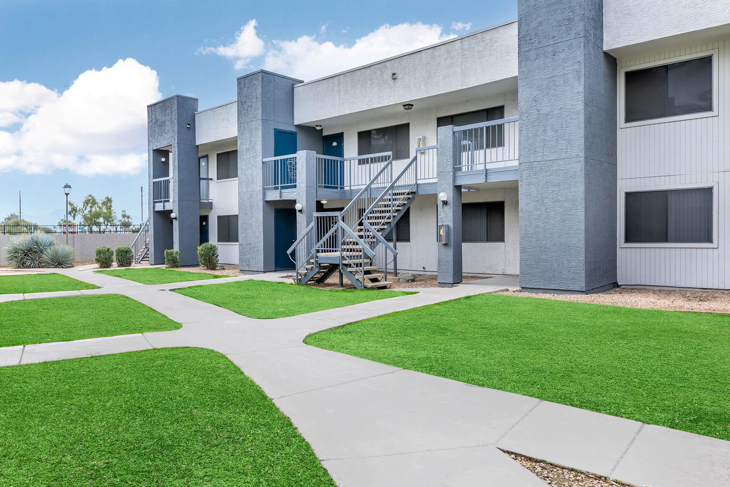 a large lawn in front of a building