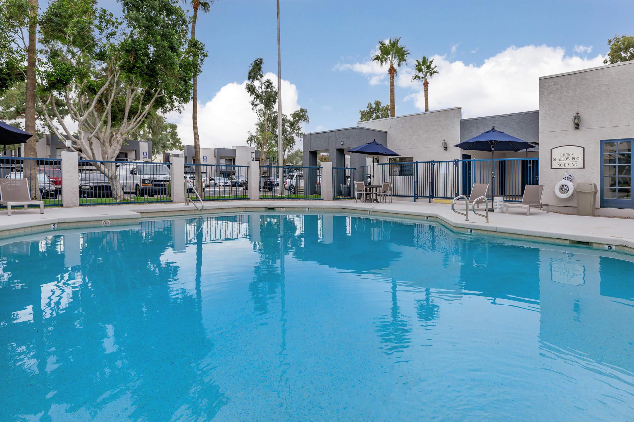 a house with a large pool of water