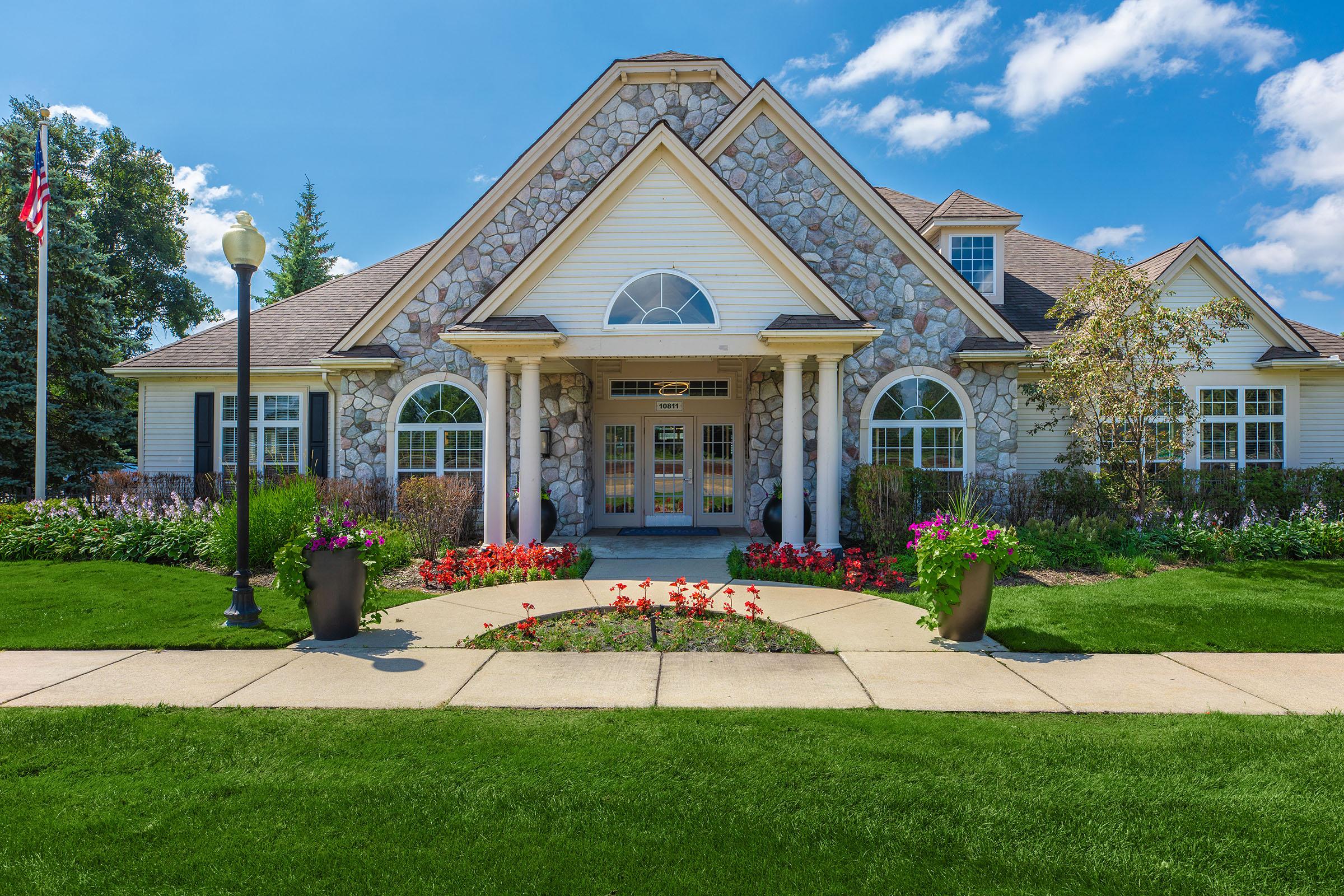 a large lawn in front of a building