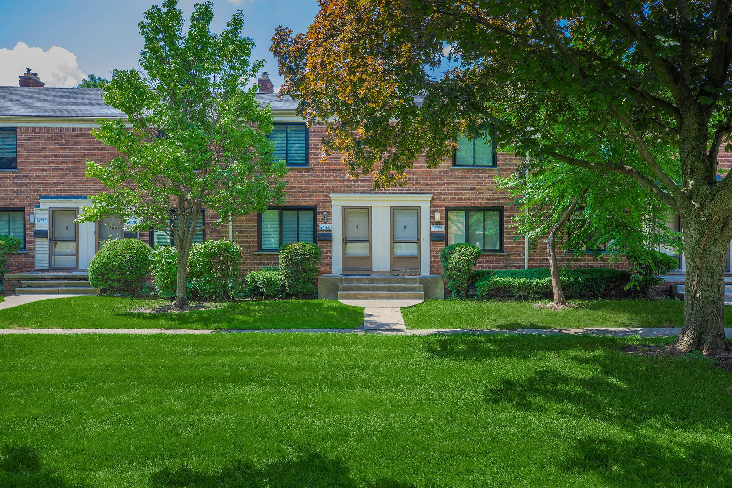 a large lawn in front of a house